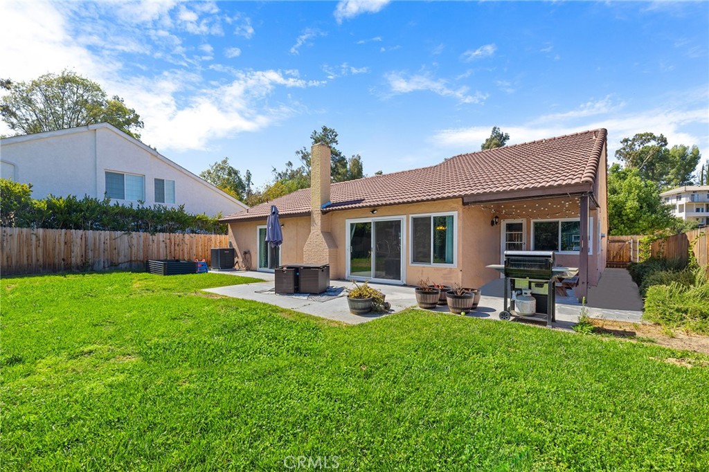 29951 Cactus Place Temecula, CA 92592 - Photo 31 of 46 a view of a house with a yard and sitting area