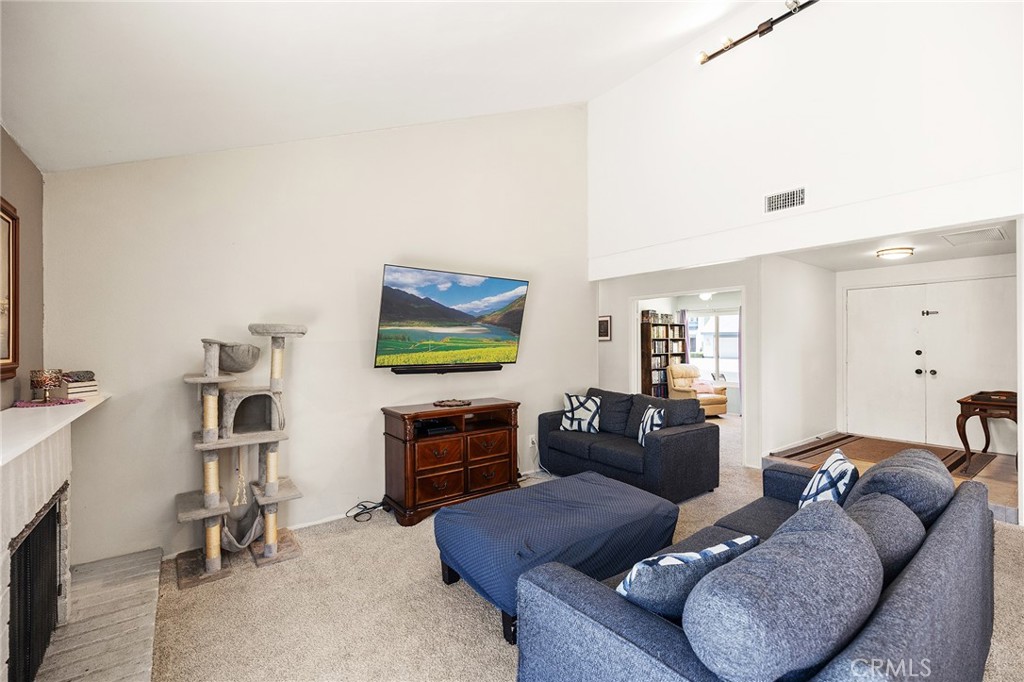 29951 Cactus Place Temecula, CA 92592 - Photo 6 of 46 a living room with furniture and a flat screen tv