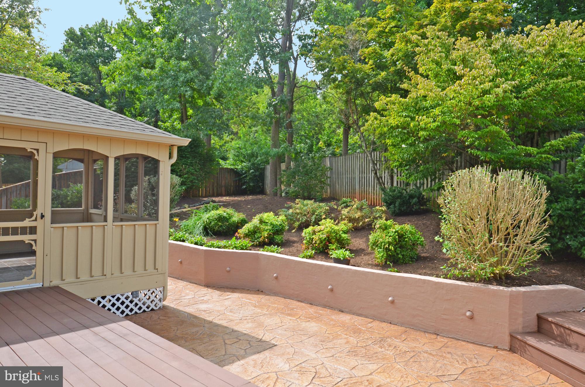 5819 Stone Ridge Drive Centreville, VA 20120 - Photo 11 of 72 Stamped concrete patio, enclosed porch & deck