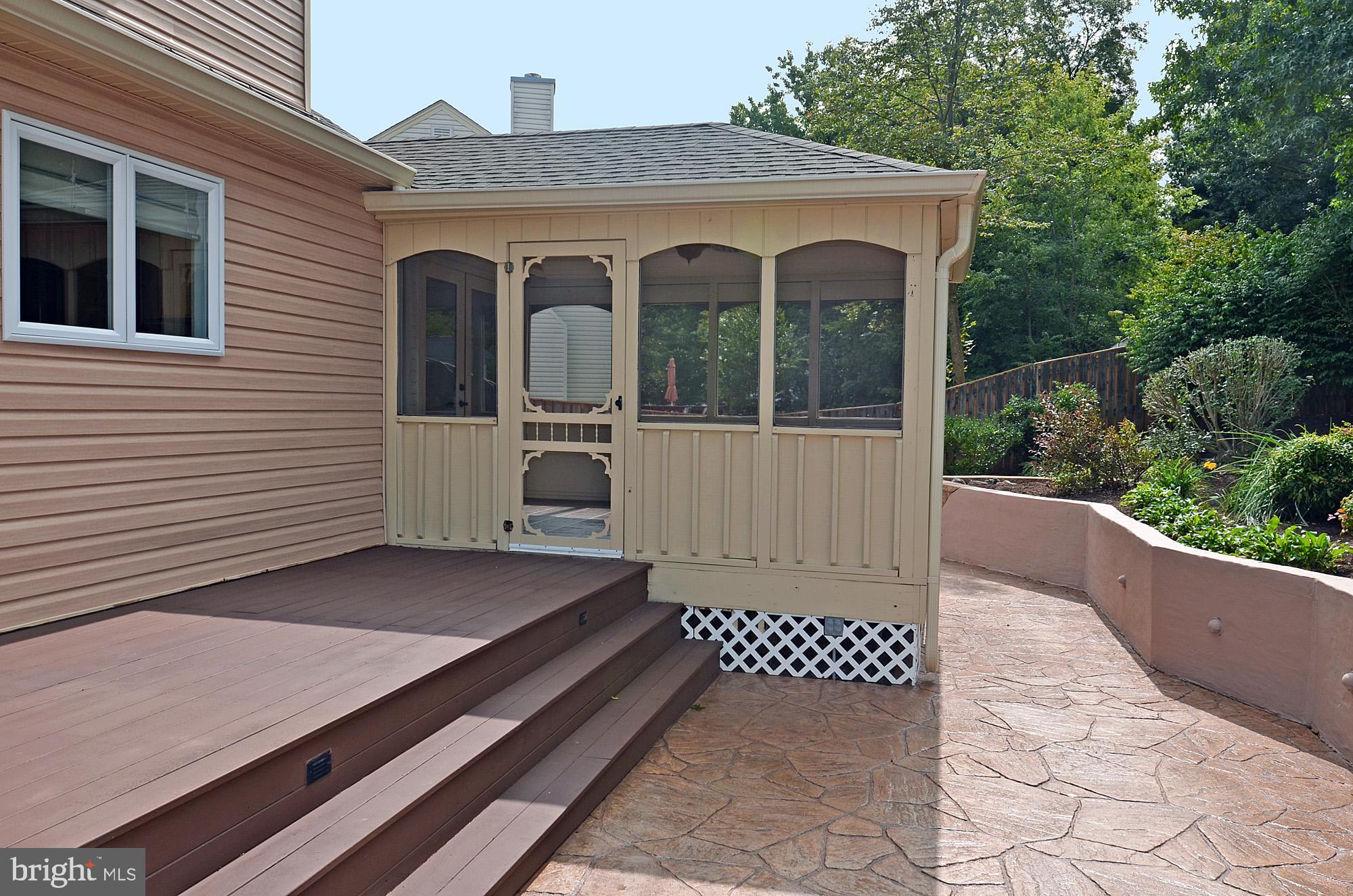 5819 Stone Ridge Drive Centreville, VA 20120 - Photo 12 of 72 Stamped concrete patio, enclosed porch & deck