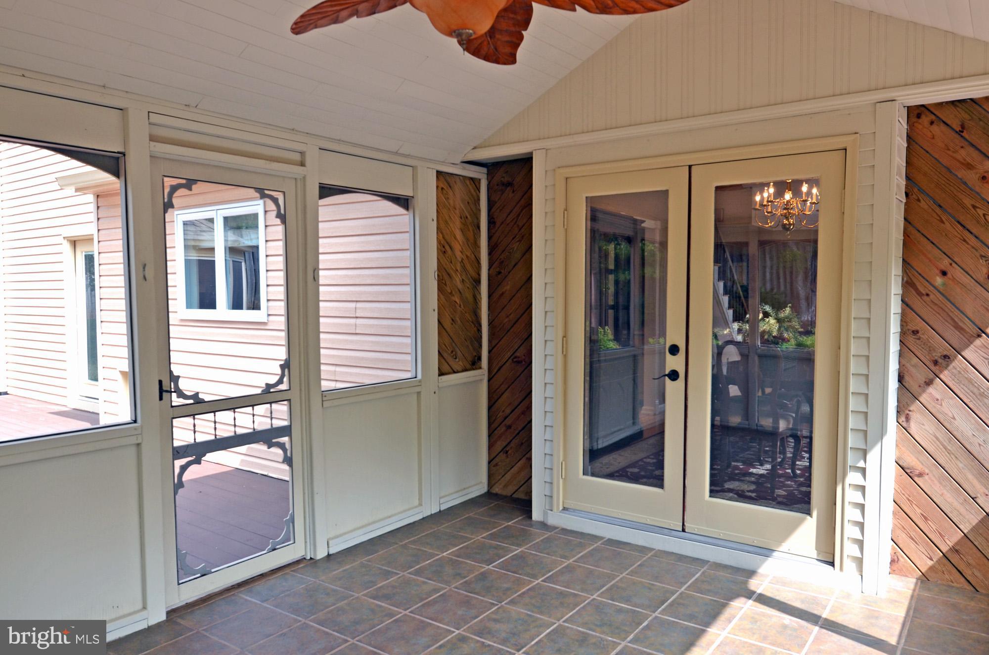 5819 Stone Ridge Drive Centreville, VA 20120 - Photo 28 of 72 Fabulous enclosed porch w/tile floor & ceiling fan