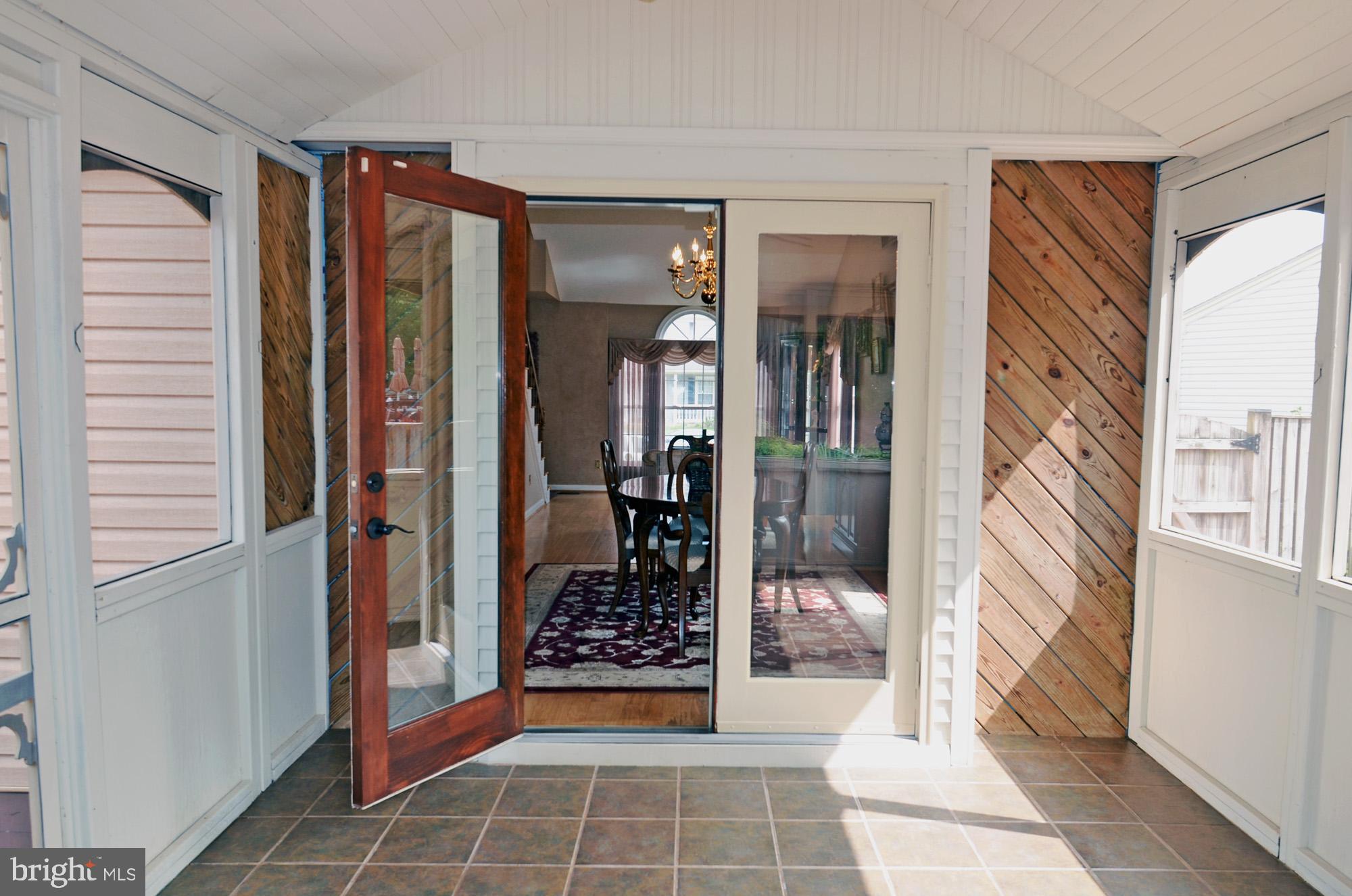 5819 Stone Ridge Drive Centreville, VA 20120 - Photo 31 of 72 Atrium doors from the DR to the enclosed porch