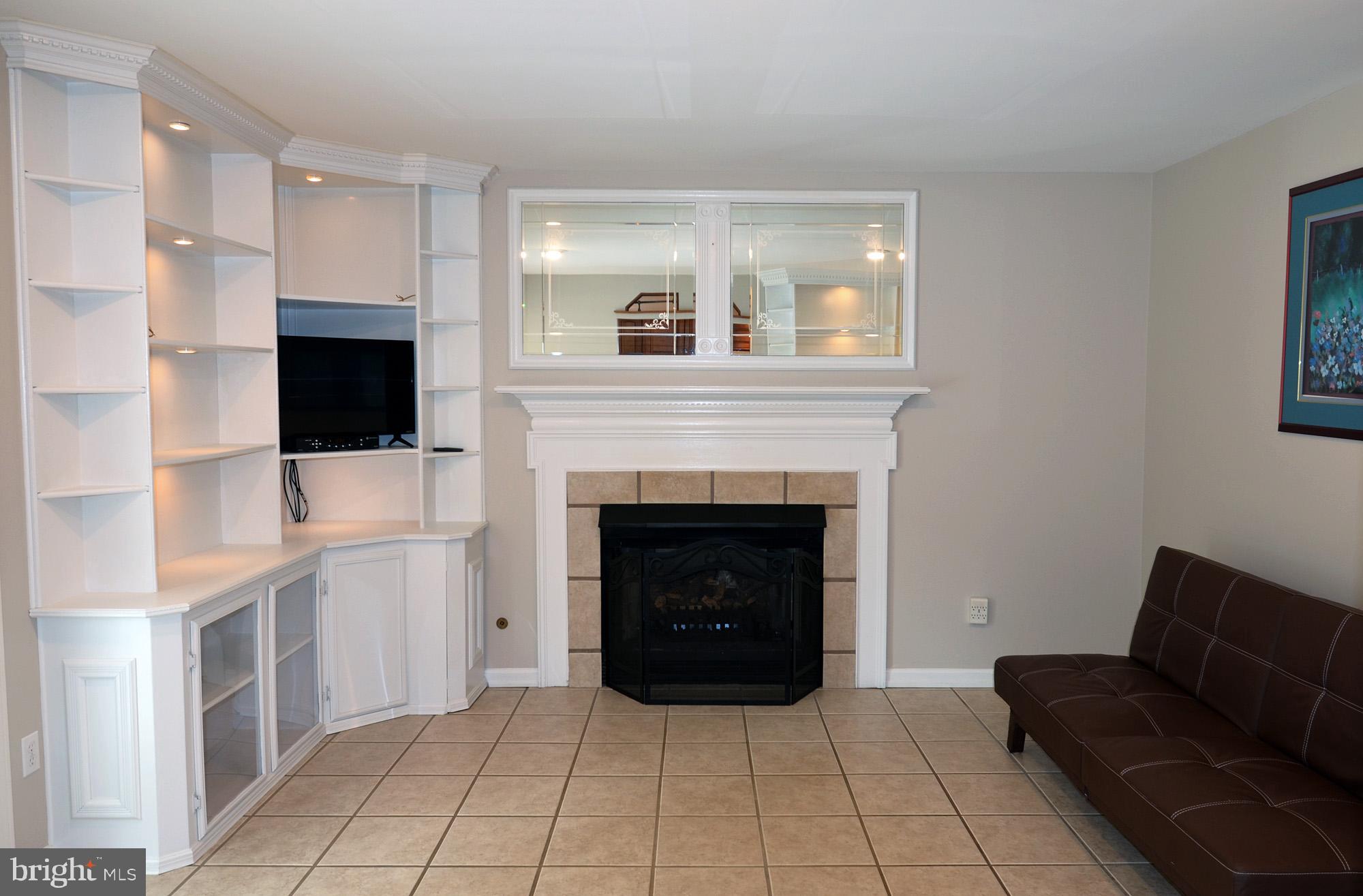 5819 Stone Ridge Drive Centreville, VA 20120 - Photo 42 of 72 Family room features a fireplace with gas logs