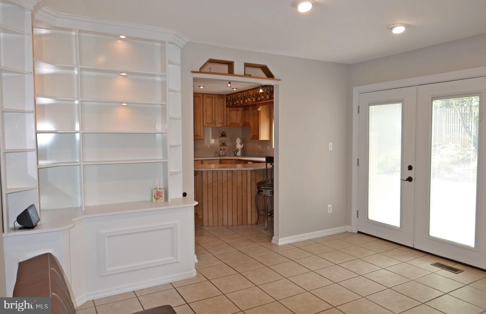 5819 Stone Ridge Drive Centreville, VA 20120 - Photo 44 of 72 Family room w/tile floor & 2 sets of built-ins