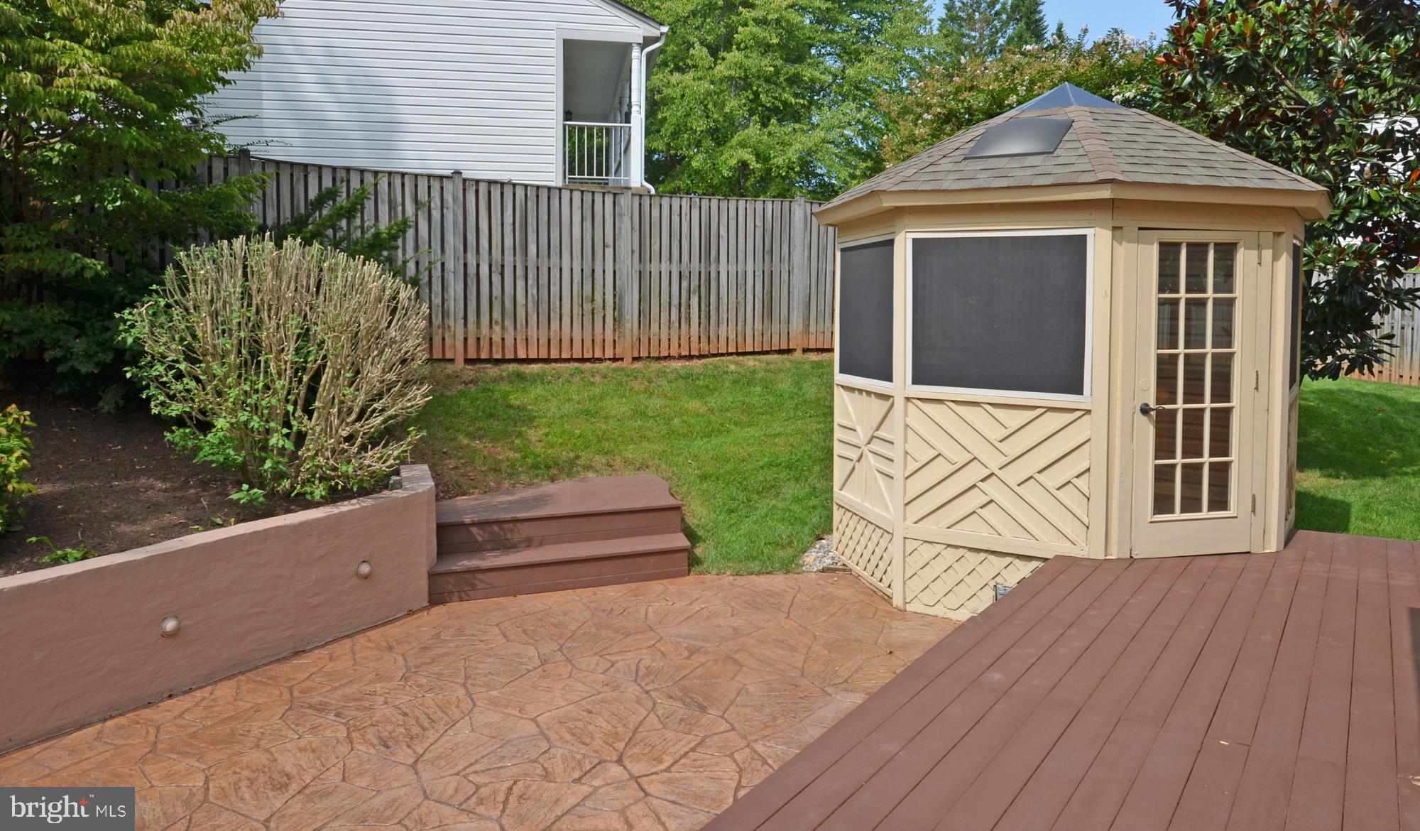 5819 Stone Ridge Drive Centreville, VA 20120 - Photo 10 of 72 Stamped concrete patio, gazebo & deck