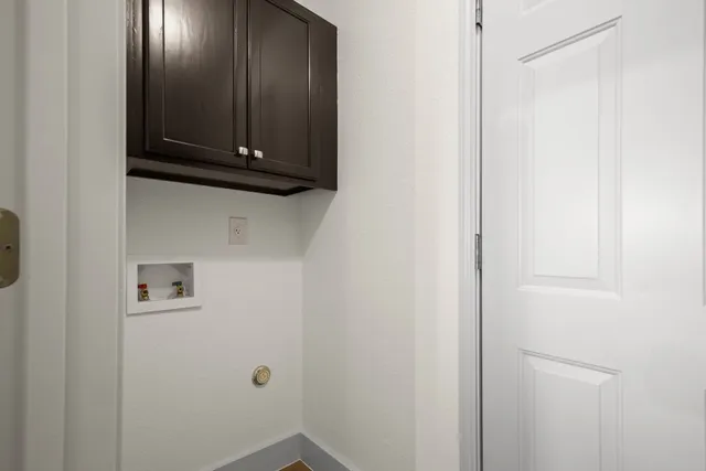a view of cabinets and dryer