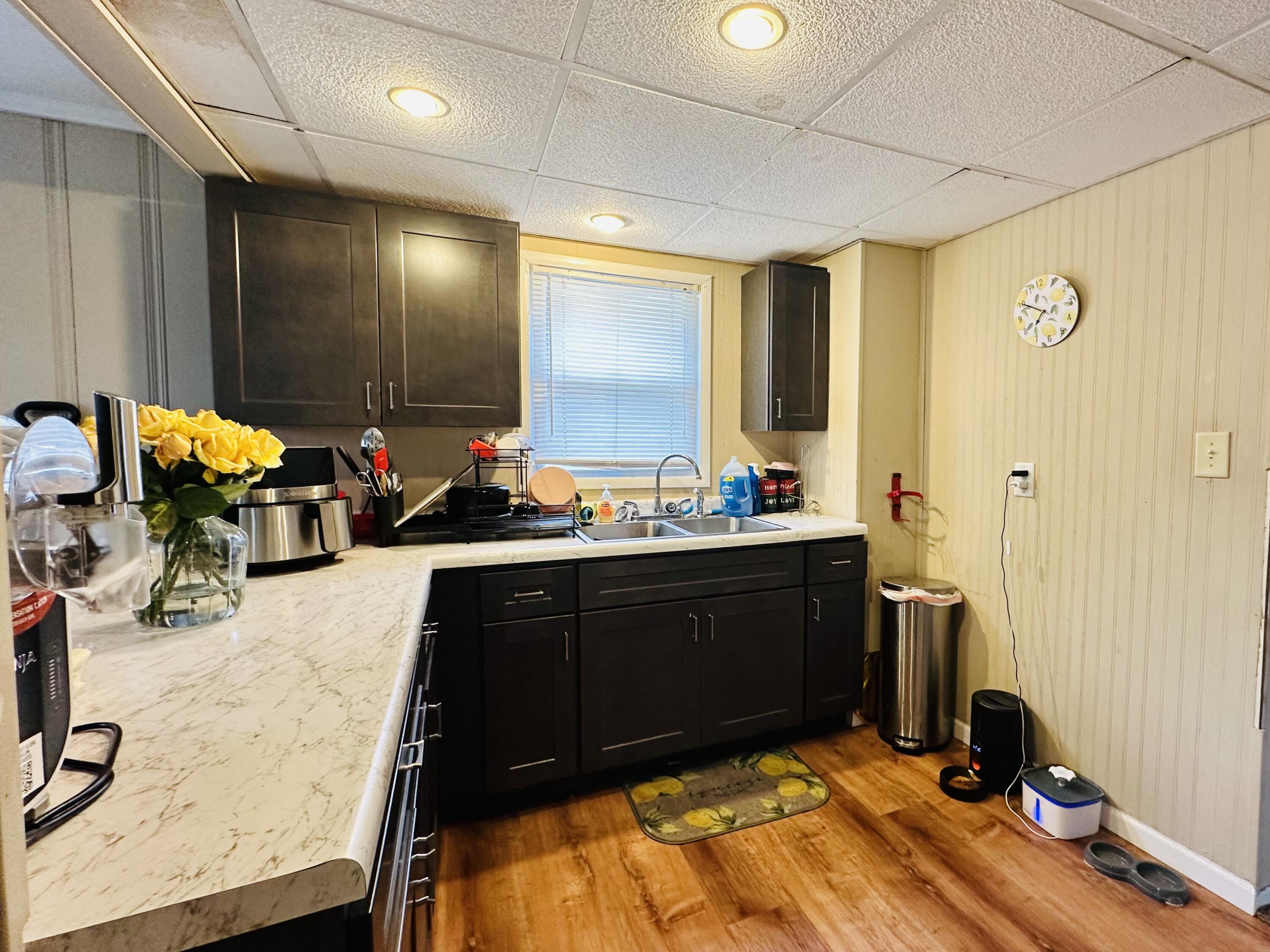 5856 Wallace Road Hammond, IN 46320 - Photo 4 of 14 a kitchen with a sink stove and refrigerator