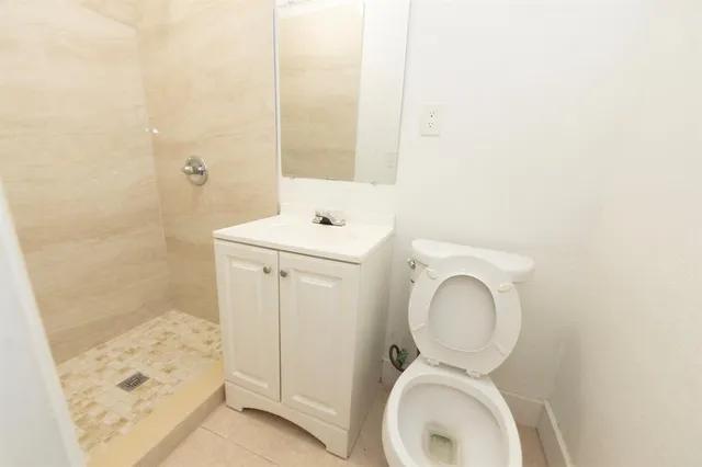 a bathroom with a toilet and a sink