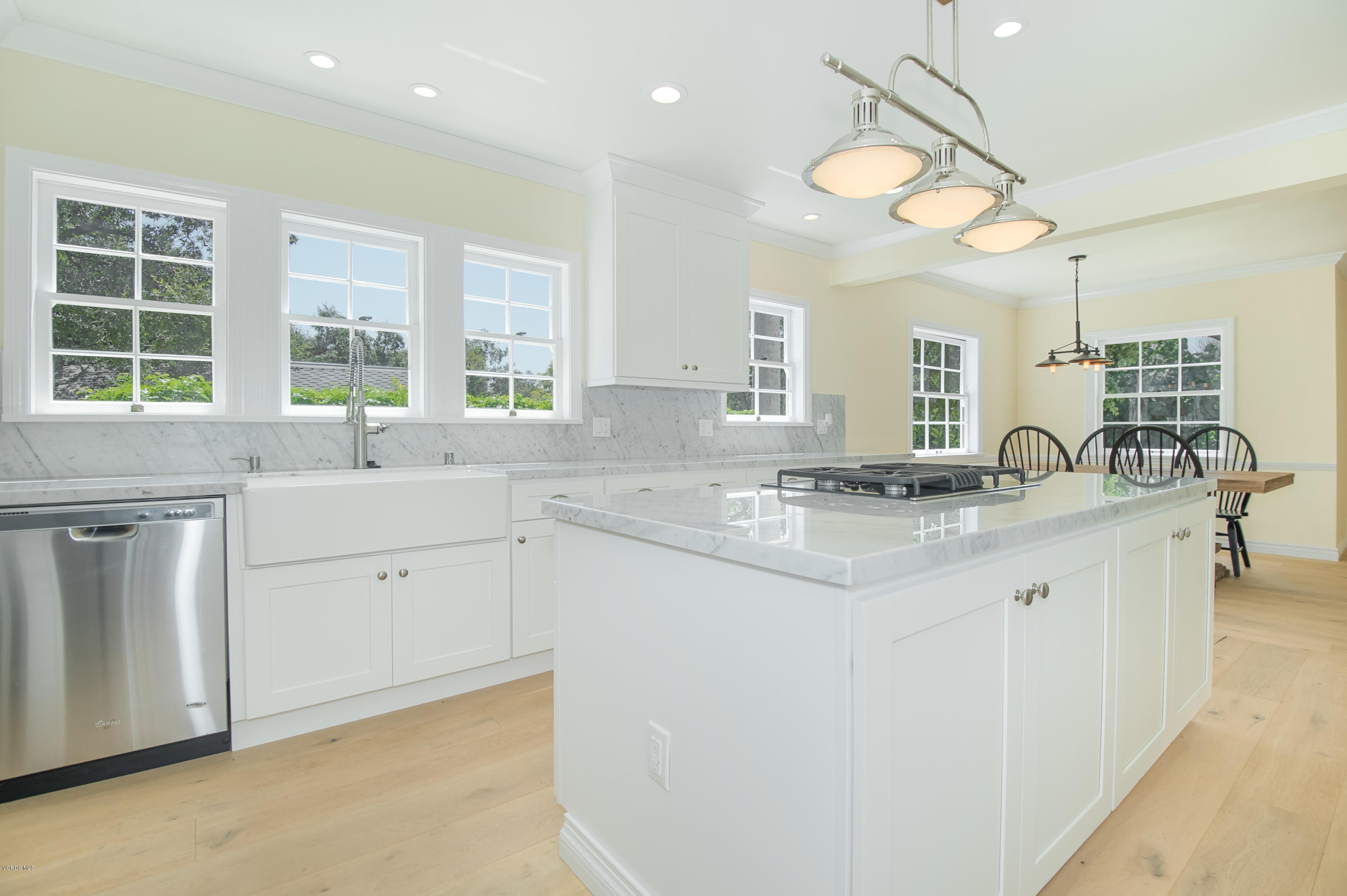 1447 Edgecliff Lane Pasadena, CA 91107 - Photo 14 of 33 a kitchen with granite countertop a sink and white cabinets