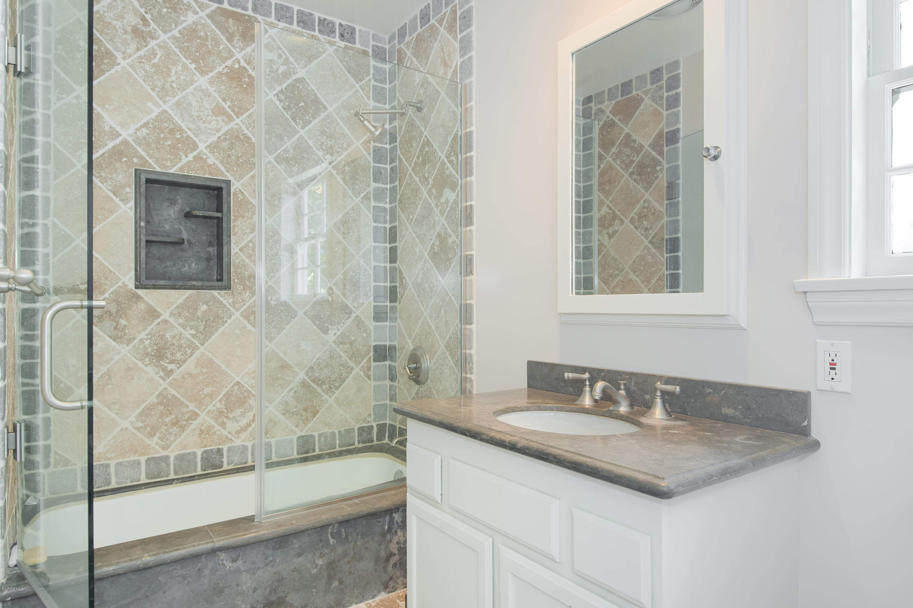 1447 Edgecliff Lane Pasadena, CA 91107 - Photo 19 of 33 a bathroom with a granite countertop sink a toilet and shower
