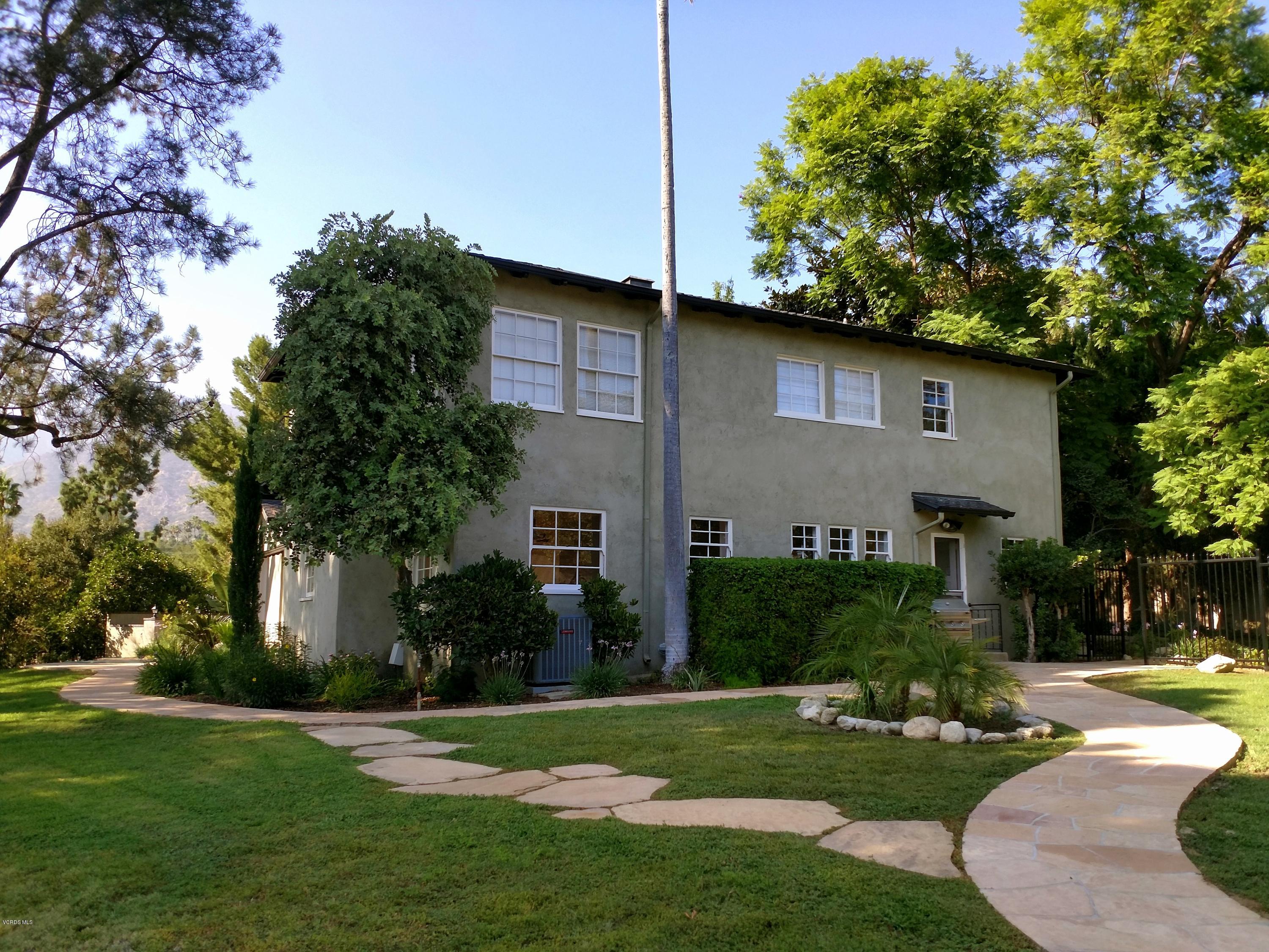 1447 Edgecliff Lane Pasadena, CA 91107 - Photo 29 of 33 a front view of a house with a yard
