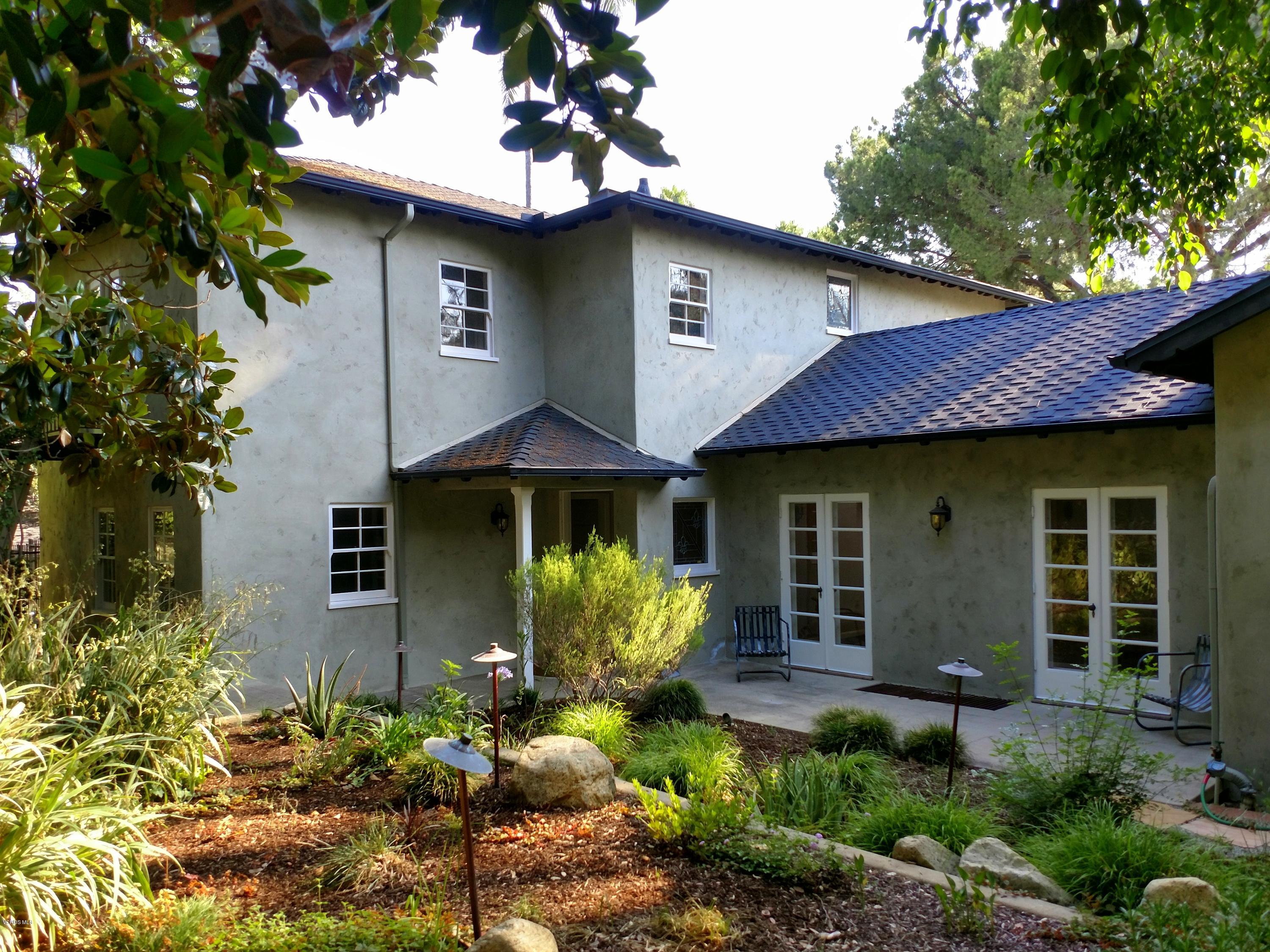 1447 Edgecliff Lane Pasadena, CA 91107 - Photo 33 of 33 a front view of a house with garden