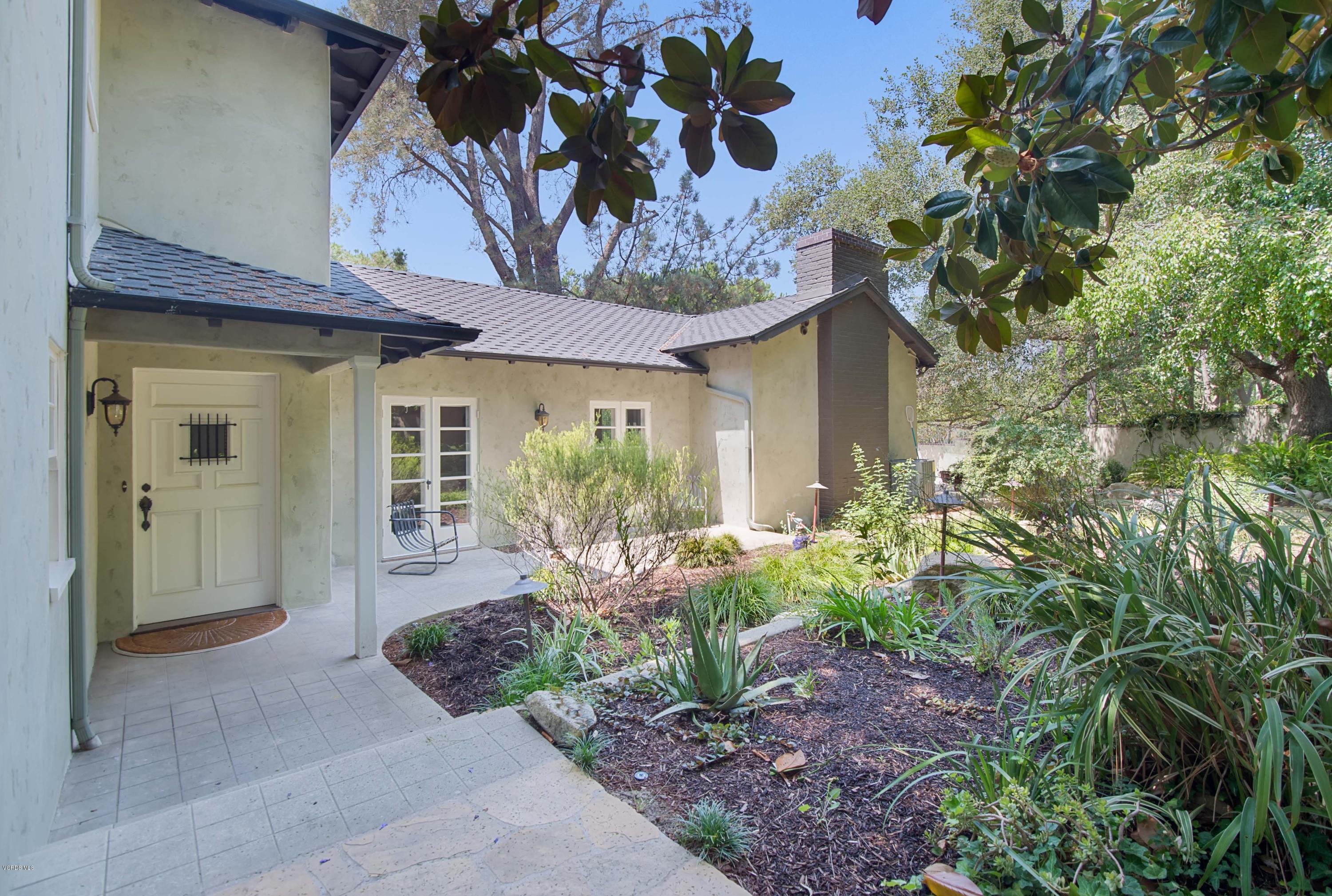 1447 Edgecliff Lane Pasadena, CA 91107 - Photo 5 of 33 a front view of a house with garden