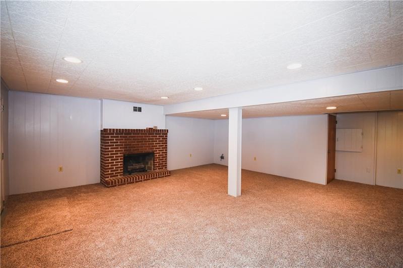 670 Lindsay Road Carnegie, PA 15106 - Photo 17 of 25 Finished Basement with Working Gas Fireplace
