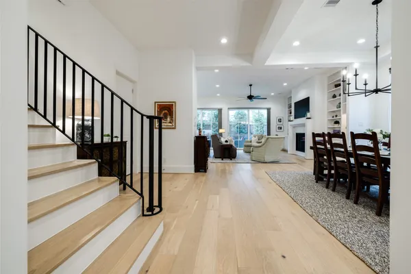 a view of a living room and entryway