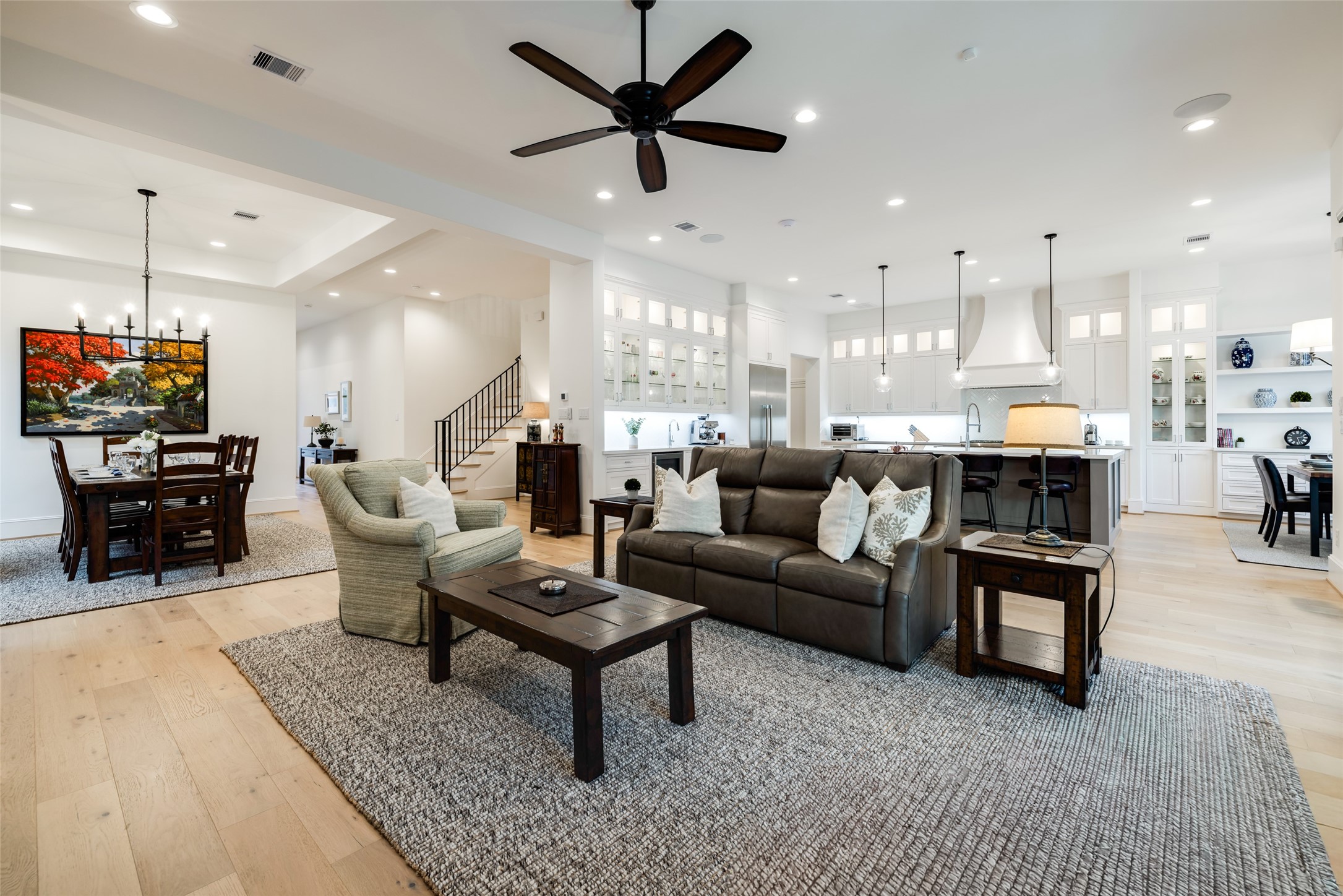 1918 Woodhead Street Houston, TX 77019 - Photo 20 of 49 a living room with furniture and kitchen view