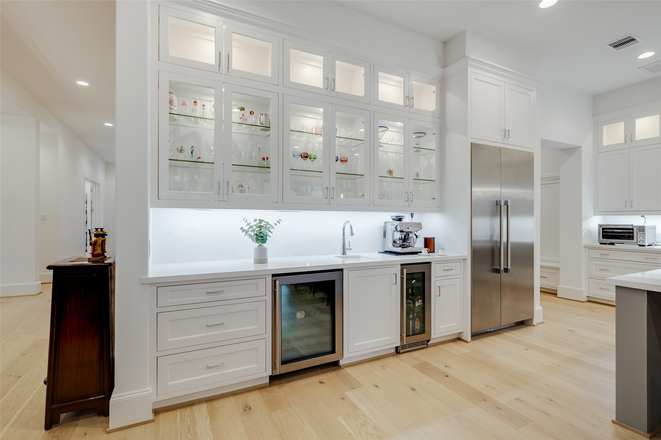 1918 Woodhead Street Houston, TX 77019 - Photo 25 of 49 a large kitchen with a stove and a refrigerator
