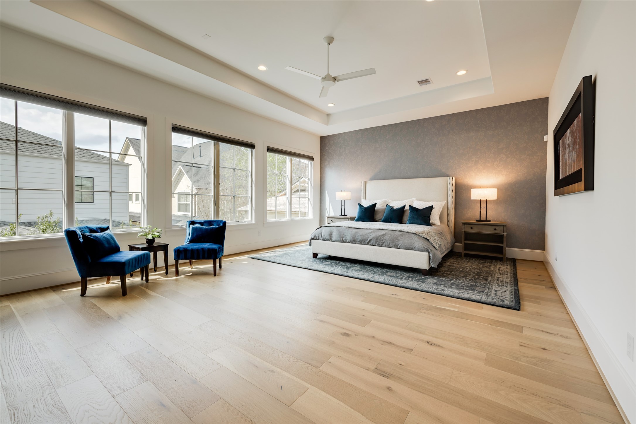 1918 Woodhead Street Houston, TX 77019 - Photo 36 of 49 a spacious bedroom with a bed and a large window