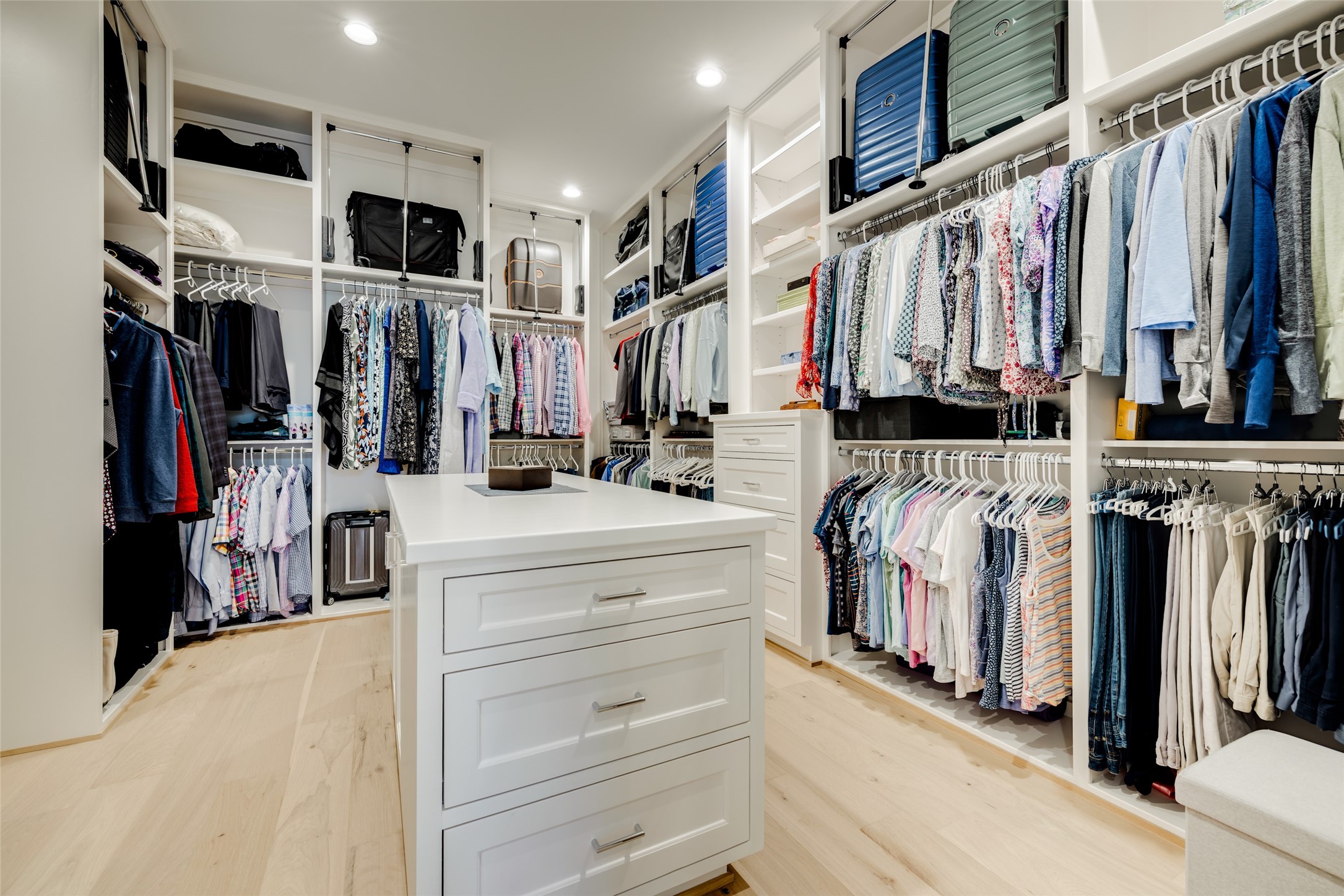 1918 Woodhead Street Houston, TX 77019 - Photo 39 of 49 a view of walk in closet with clothes and shoes