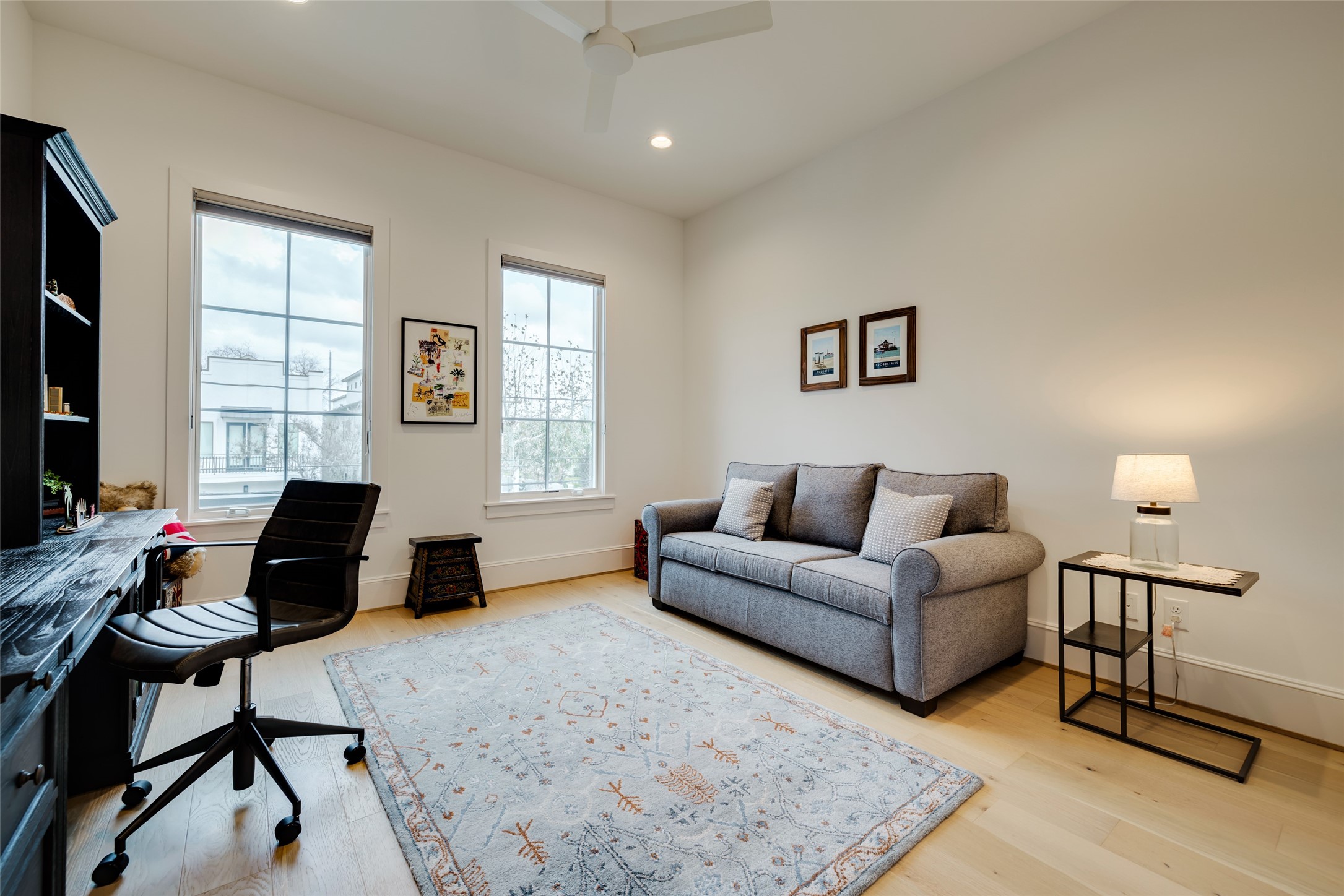 1918 Woodhead Street Houston, TX 77019 - Photo 41 of 49 a living room with furniture and a window