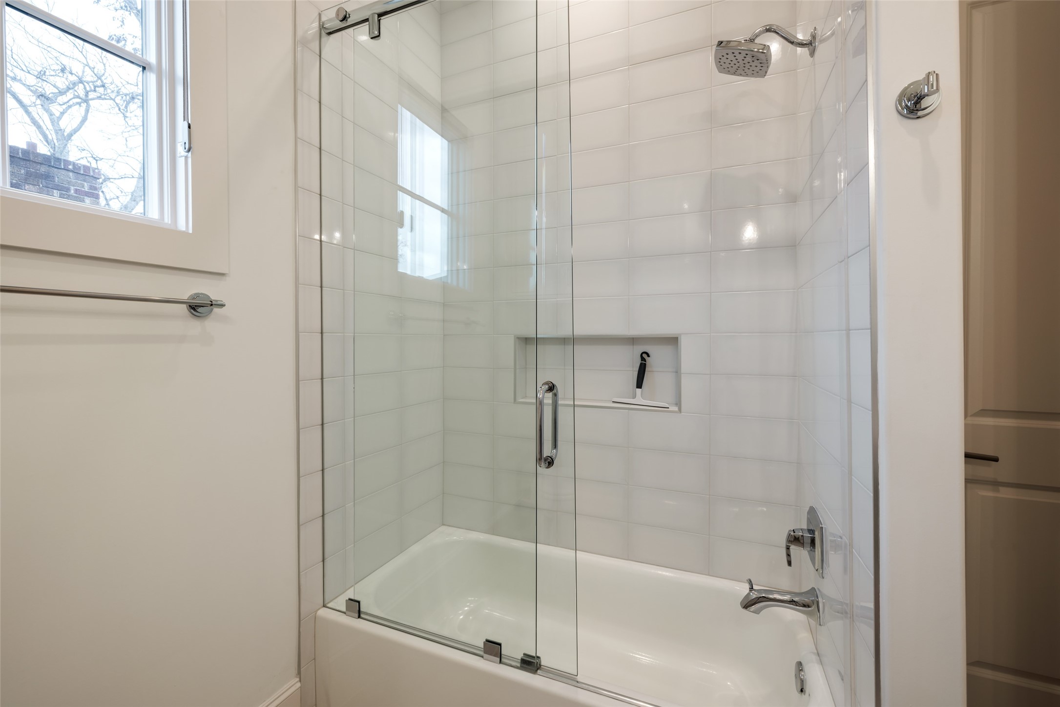 1918 Woodhead Street Houston, TX 77019 - Photo 46 of 49 a bathroom with a bathtub