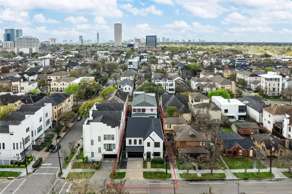 an aerial view of a city with lots of residential buildings