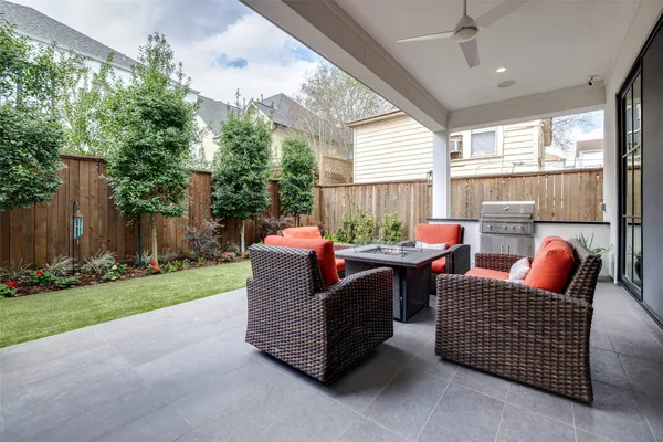 a outdoor living space with furniture and garden view