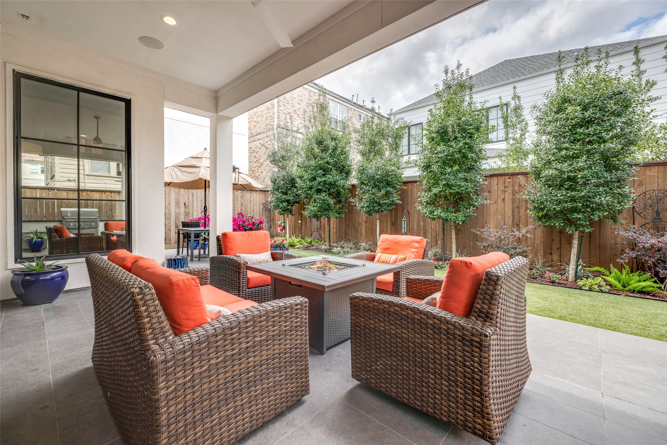 1918 Woodhead Street Houston, TX 77019 - Photo 10 of 49 a outdoor living space with patio furniture and garden view