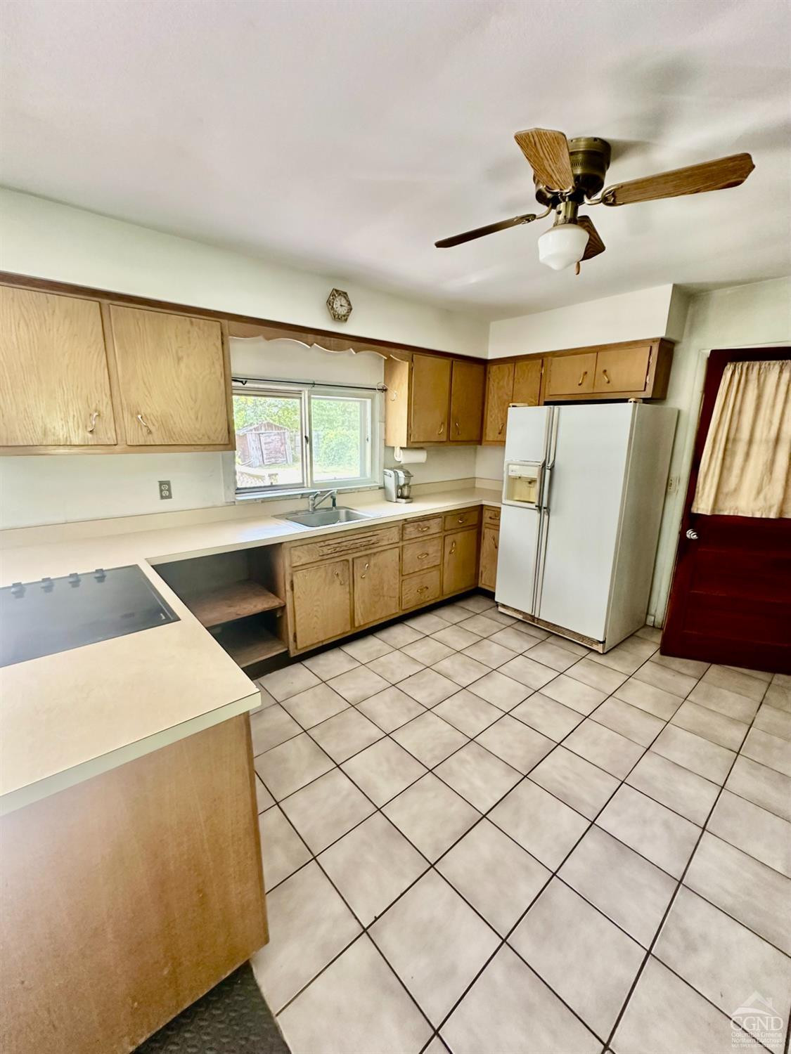 215 Vernal Butler Road Cairo, NY 12413 - Photo 11 of 24 a kitchen that has a sink and a stove in it