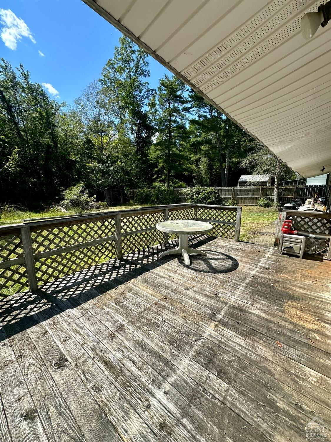 215 Vernal Butler Road Cairo, NY 12413 - Photo 17 of 24 a view of a wooden deck with chairs and wooden fence