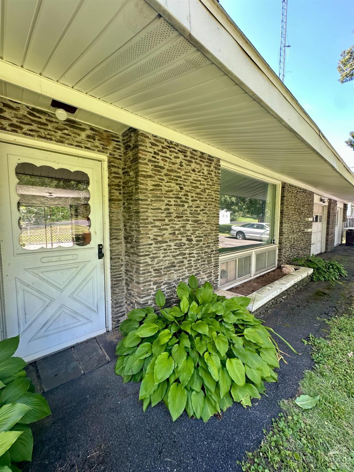 215 Vernal Butler Road Cairo, NY 12413 - Photo 24 of 24 a front view of a house with garden