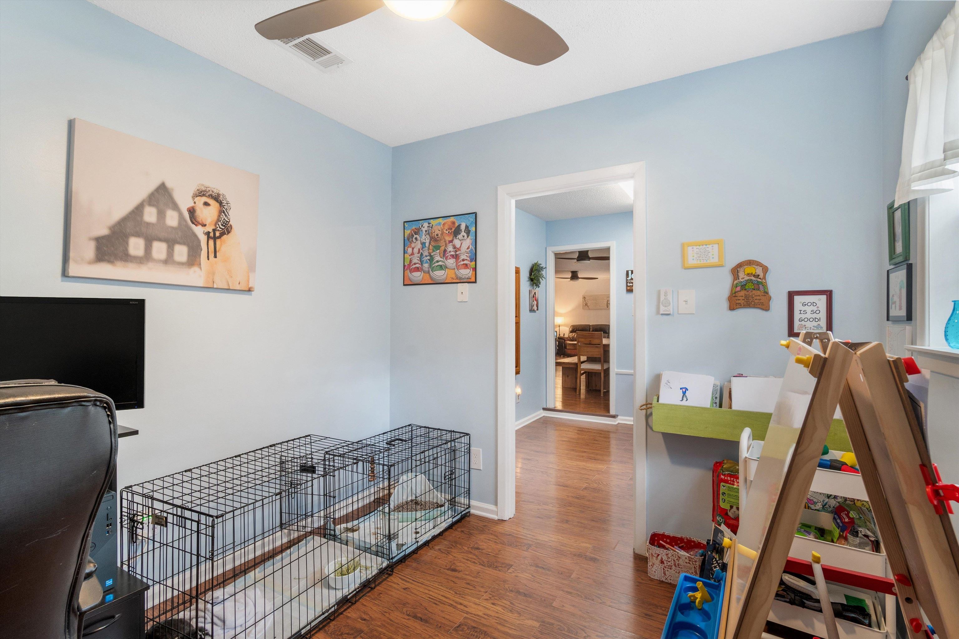 2984 Ruffle Drive Bartlett, TN 38134 - Photo 11 of 31 a living room with furniture and a wooden floor