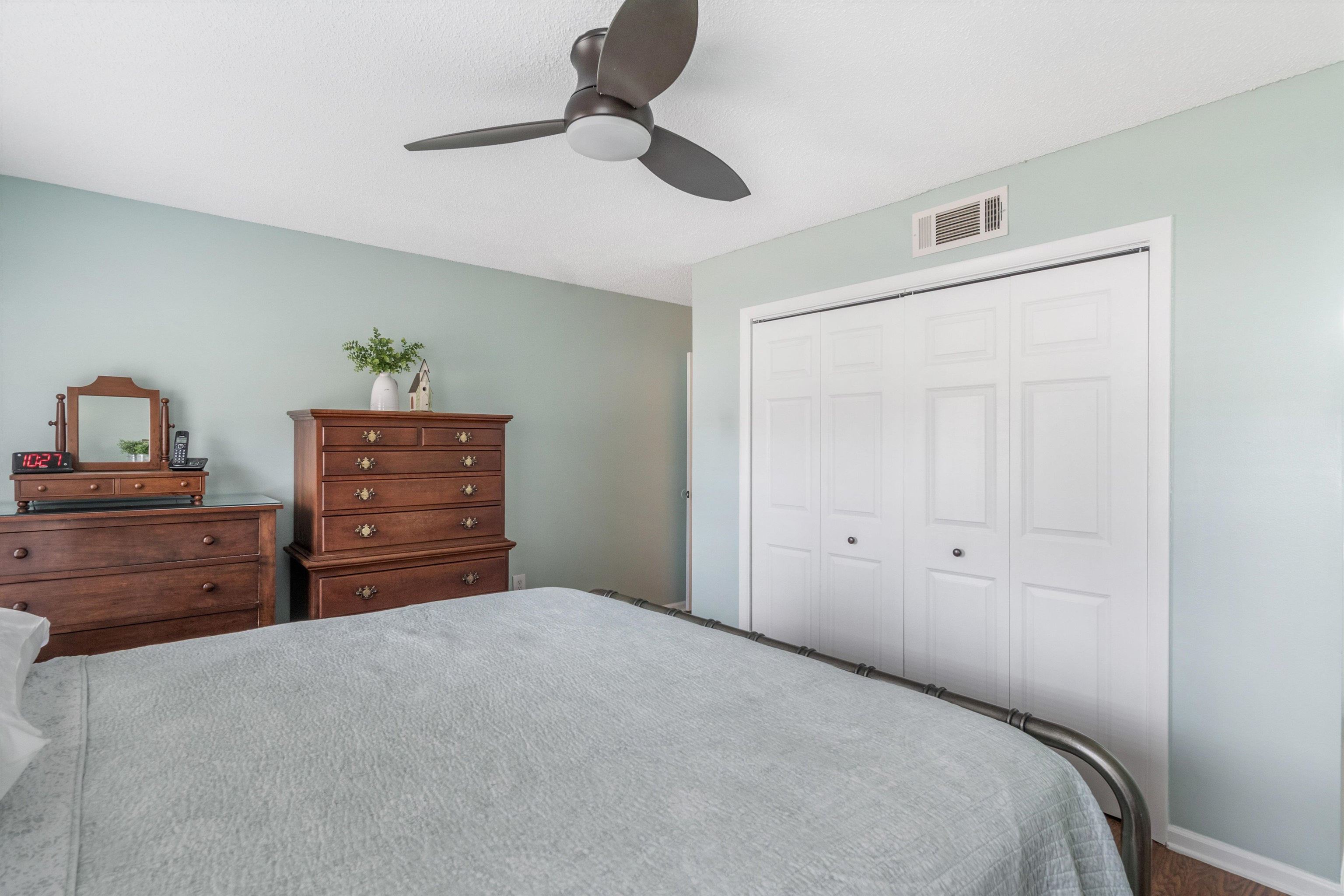 2984 Ruffle Drive Bartlett, TN 38134 - Photo 13 of 31 a bedroom with a bed and a dresser