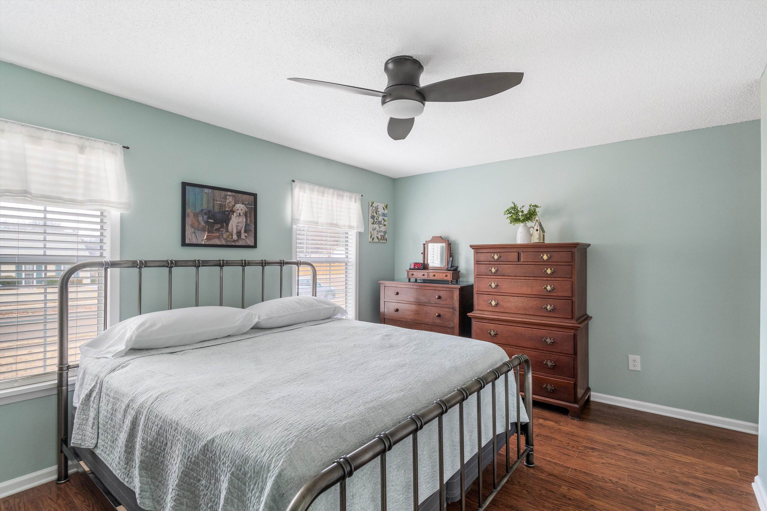 2984 Ruffle Drive Bartlett, TN 38134 - Photo 14 of 31 a bedroom with a bed and wooden floor