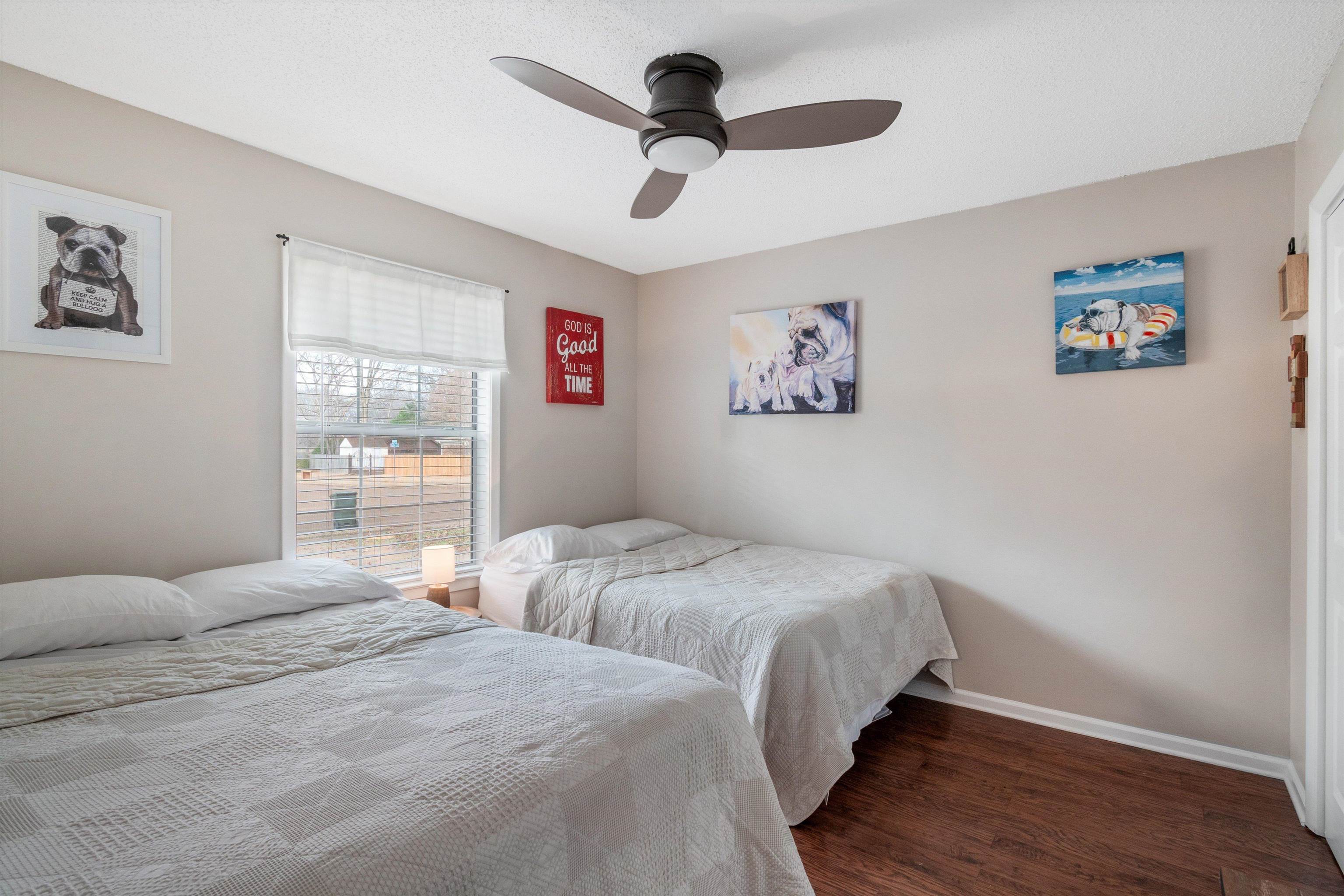 2984 Ruffle Drive Bartlett, TN 38134 - Photo 17 of 31 a bedroom with a large bed and a chandelier