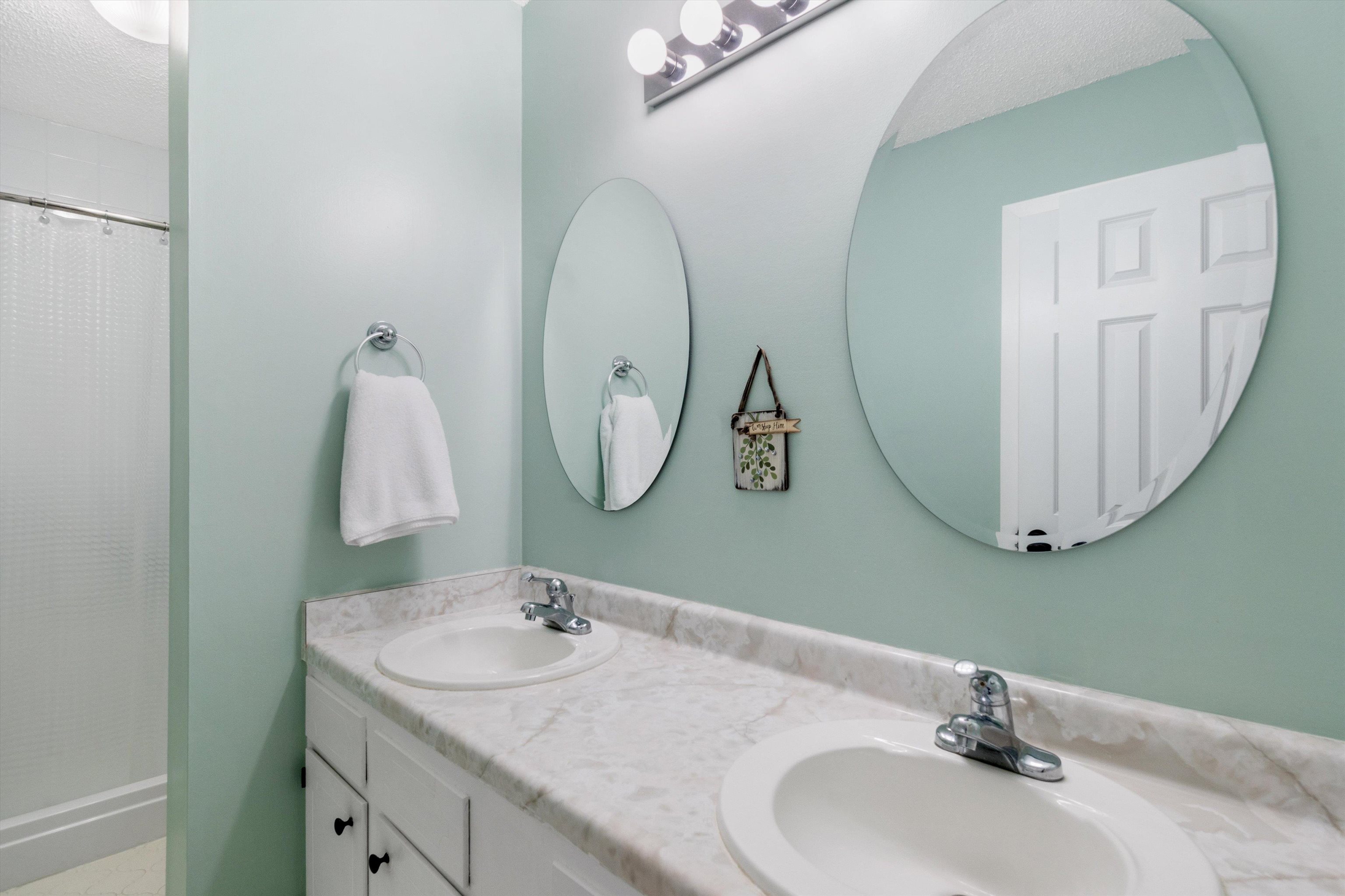 2984 Ruffle Drive Bartlett, TN 38134 - Photo 20 of 31 a bathroom with a sink and a mirror