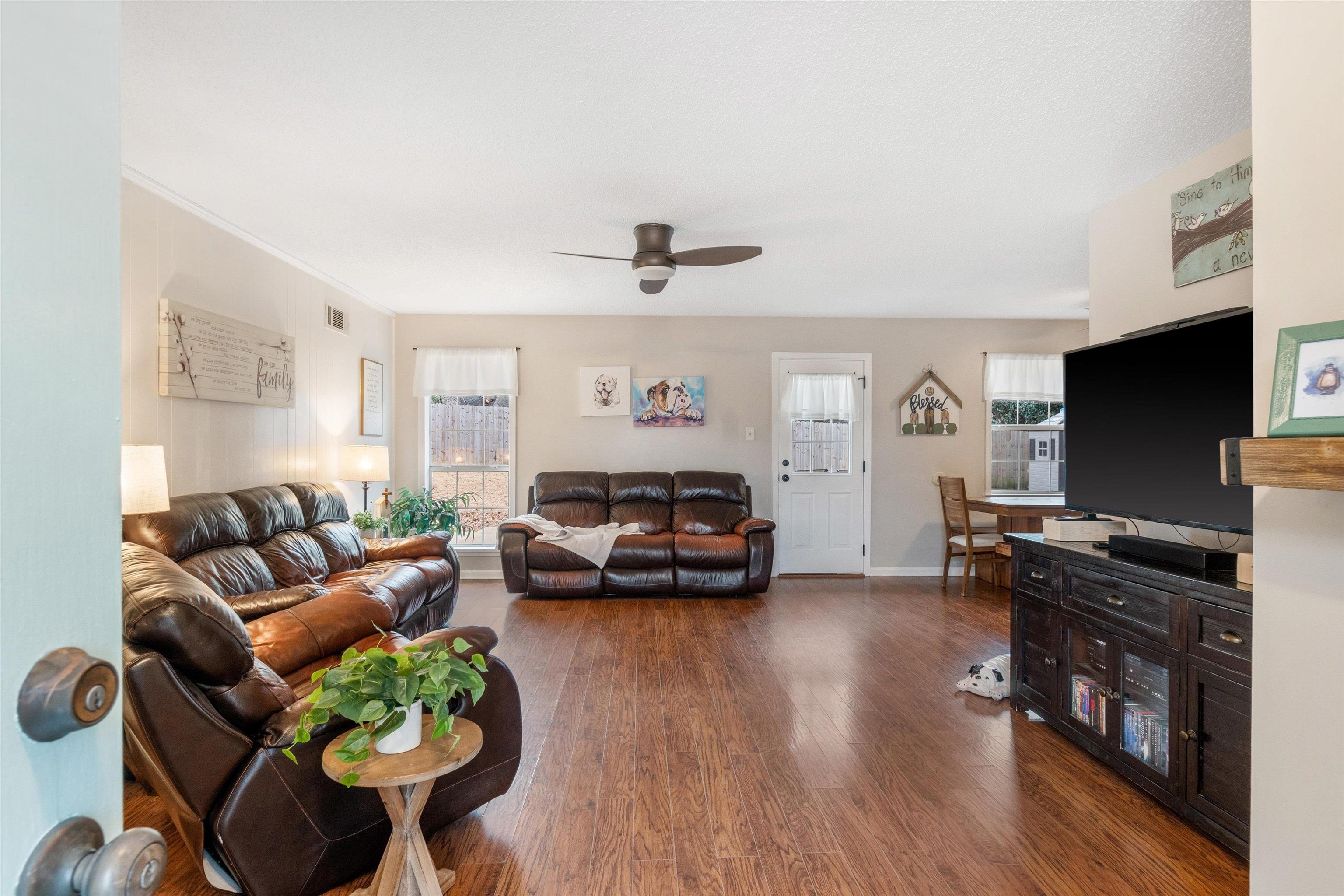 2984 Ruffle Drive Bartlett, TN 38134 - Photo 2 of 31 a living room with furniture and a flat screen tv
