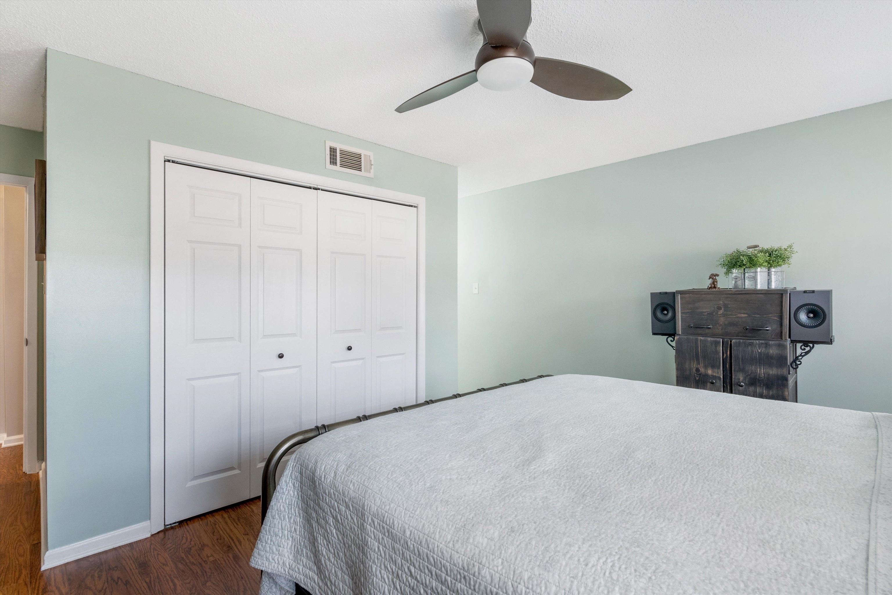 2984 Ruffle Drive Bartlett, TN 38134 - Photo 24 of 31 a bedroom with a bed and a chandelier