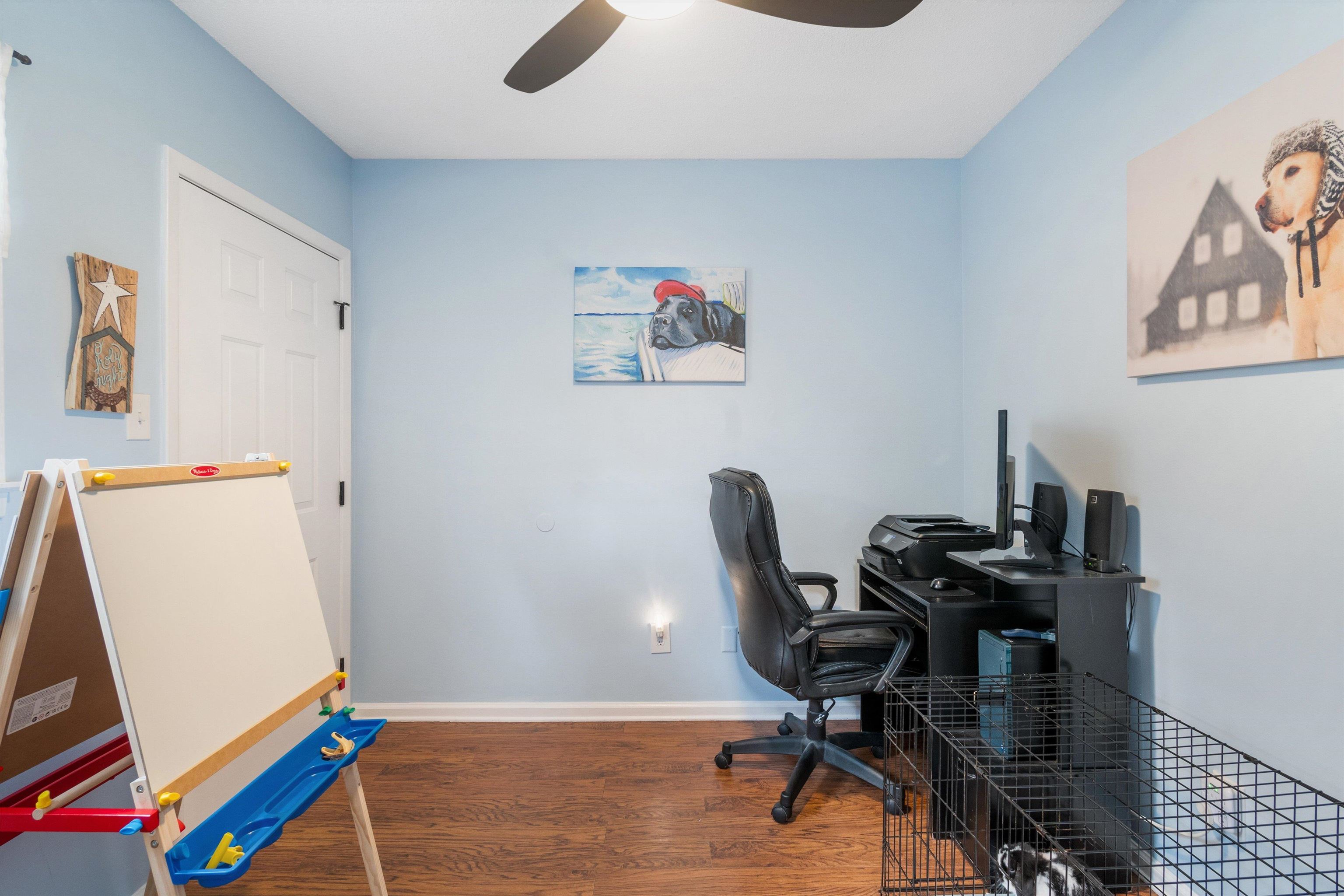 2984 Ruffle Drive Bartlett, TN 38134 - Photo 10 of 31 a view of a workspace with furniture and wooden floor