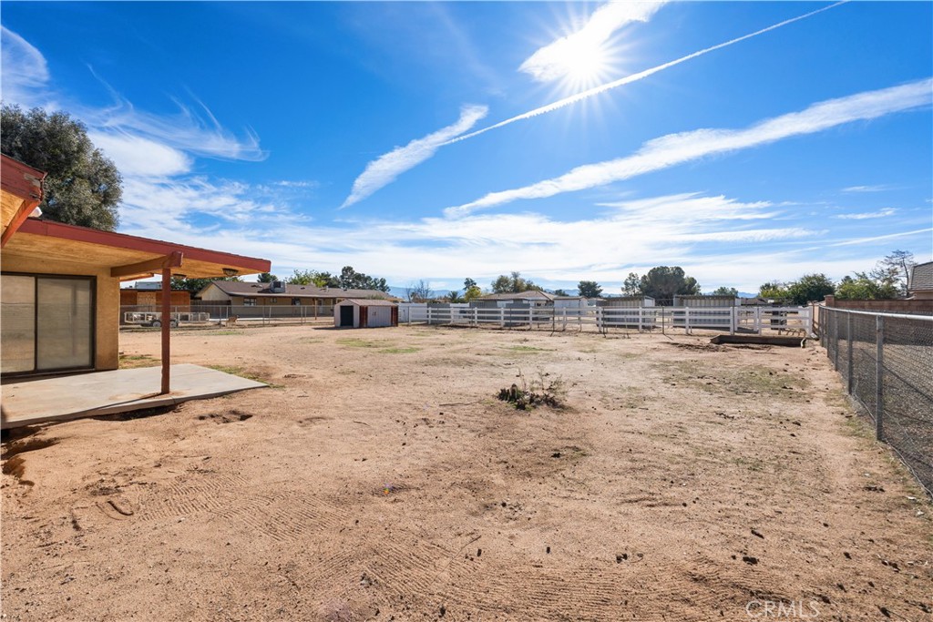 18891 Shoshonee Road Apple Valley, CA 92307 - Photo 20 of 33 a view of a yard