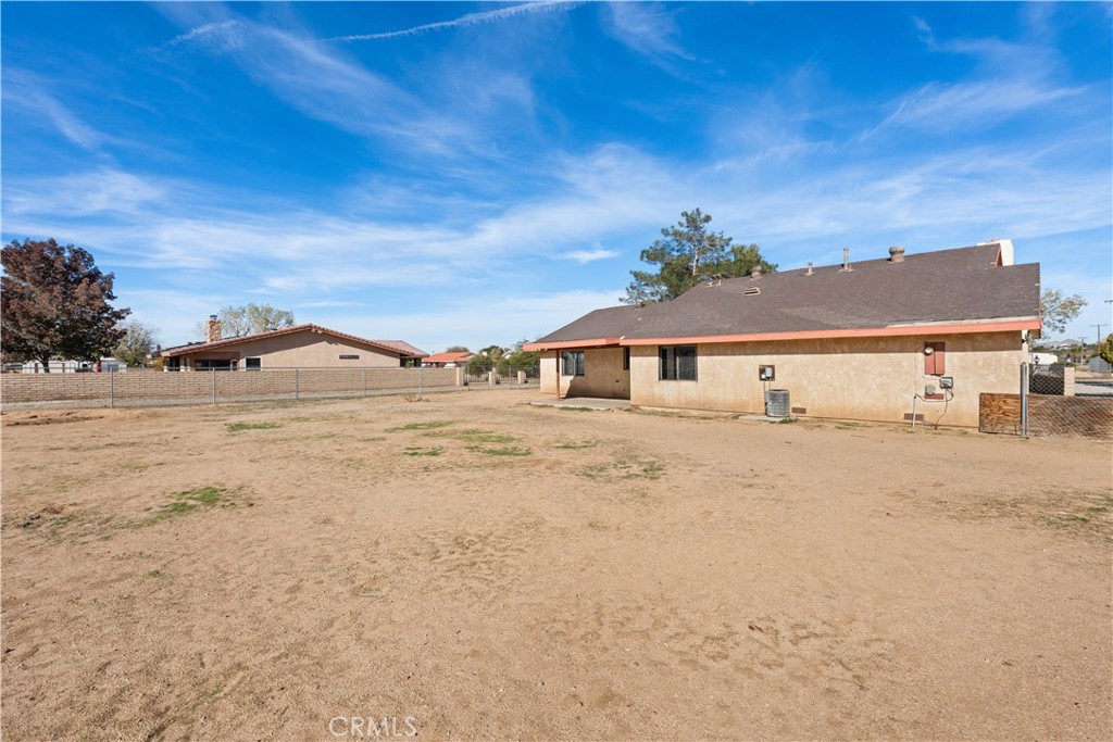 18891 Shoshonee Road Apple Valley, CA 92307 - Photo 23 of 33 a front view of a house with a ocean view