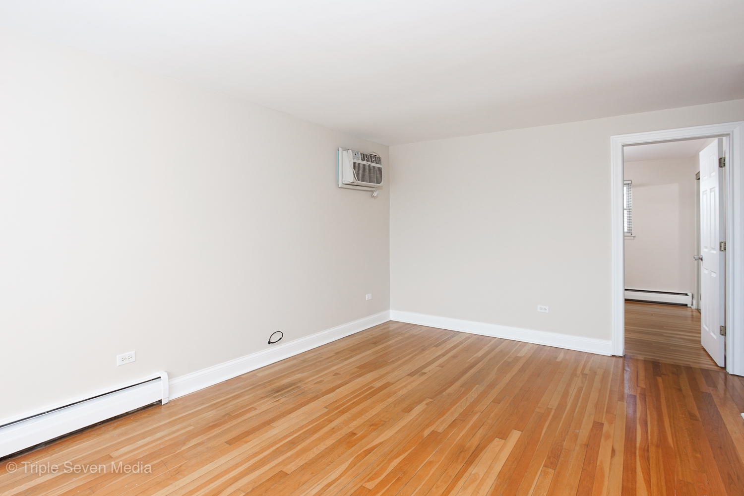 6952 West 65th Street, Unit 3C Chicago, IL 60638 - Photo 12 of 17 a view of a room with wooden floor