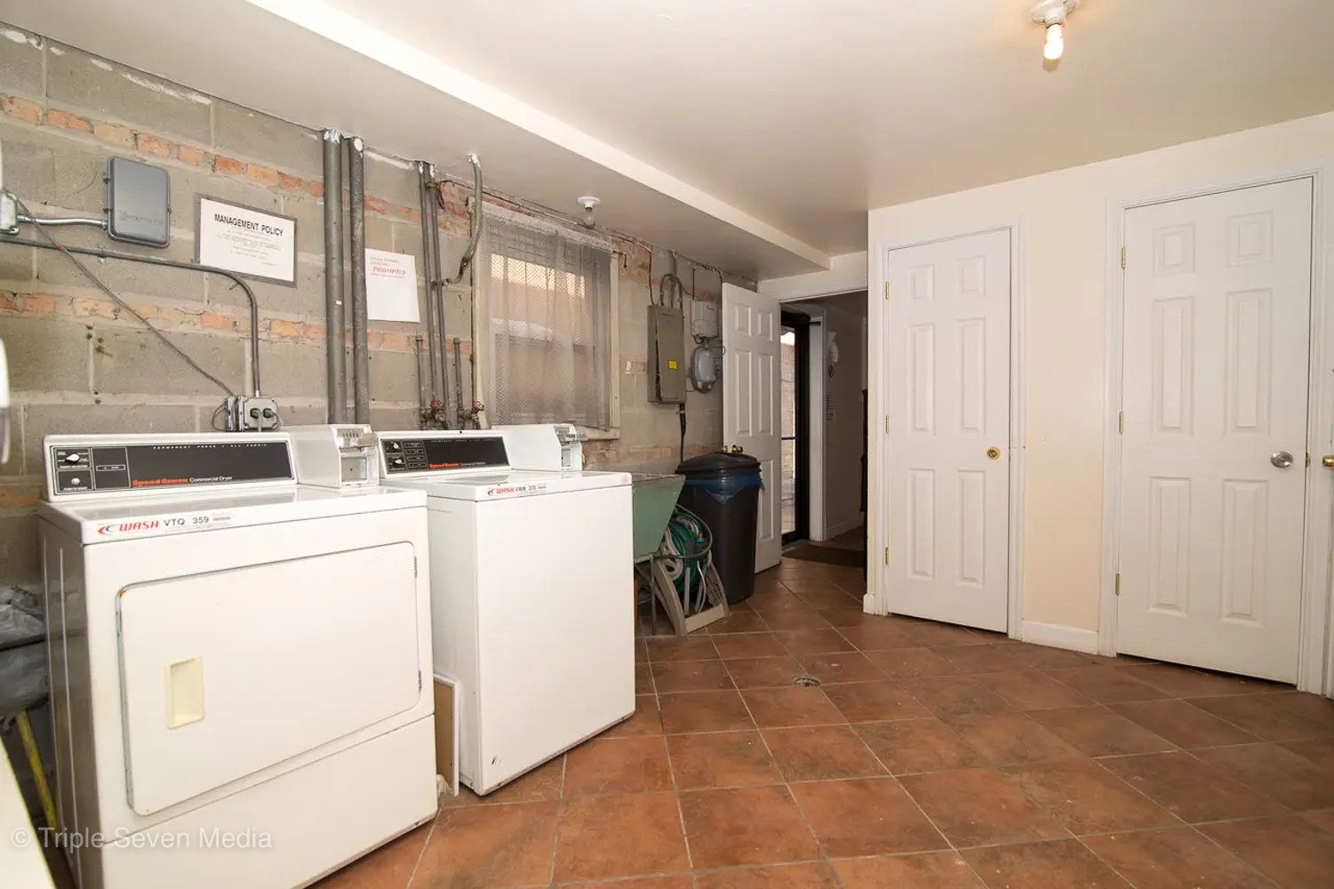 6952 West 65th Street, Unit 3C Chicago, IL 60638 - Photo 15 of 17 an entryway with a washer and dryer