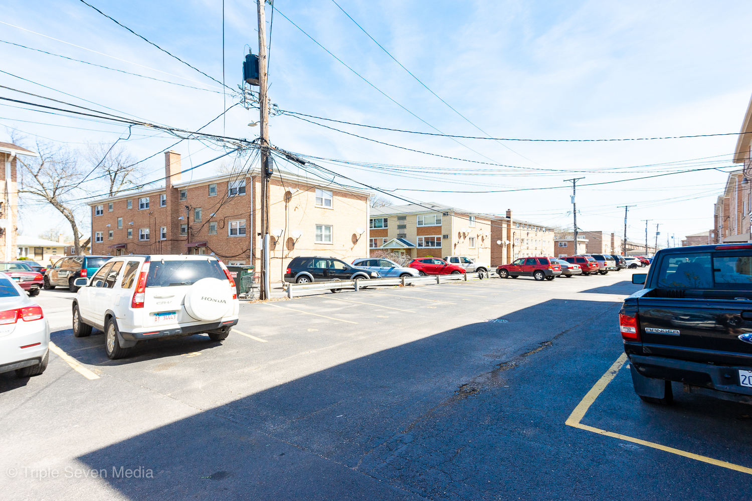 6952 West 65th Street, Unit 3C Chicago, IL 60638 - Photo 17 of 17 a cars parked on the side of a street