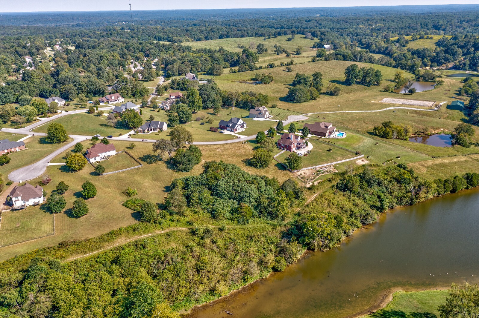 0 Trinity Burns, TN 37029 - Photo 12 of 18 an aerial view of residential houses with outdoor space and lake view