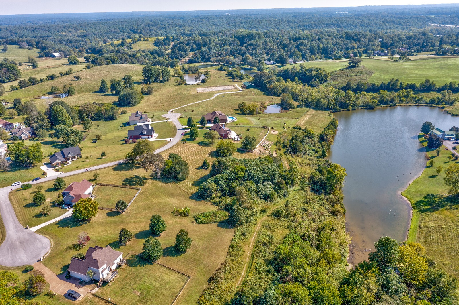 0 Trinity Burns, TN 37029 - Photo 14 of 18 an aerial view of residential houses with outdoor space and river