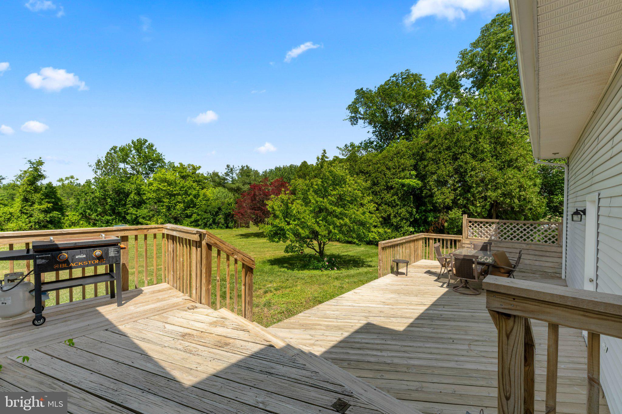 607 Chesterfield Arneytown Road Chesterfield, NJ 08515 - Photo 39 of 57 Serene deck overlooking lush greenery.