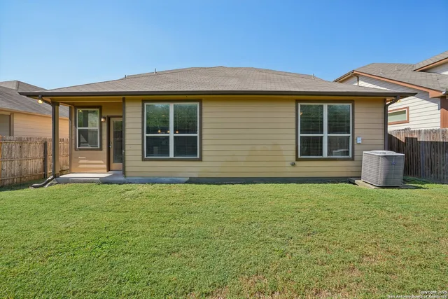 a house with garden in front of it