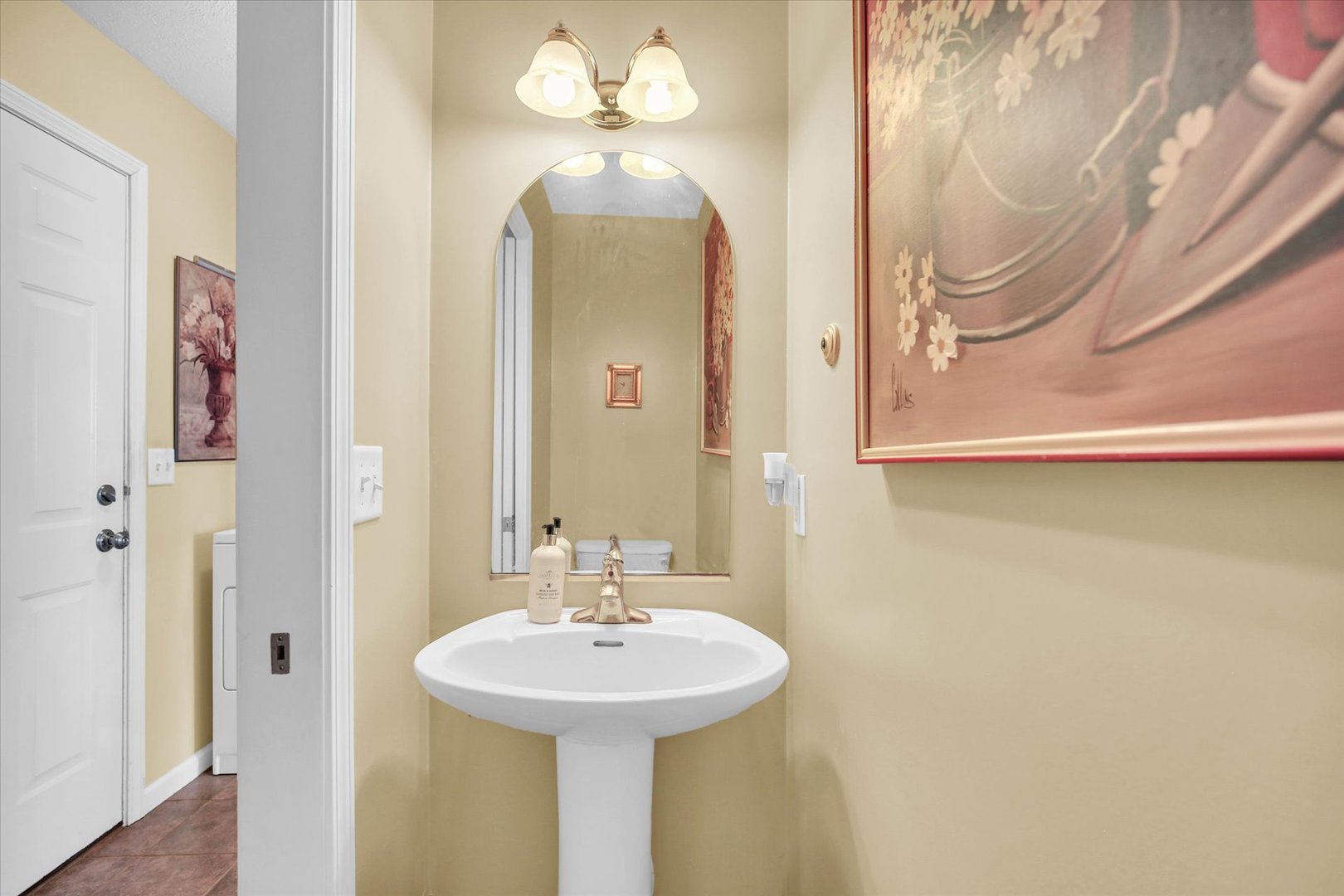 4619 Copper Ridge Road Champaign, IL 61822 - Photo 15 of 29 a bathroom with a sink and a mirror