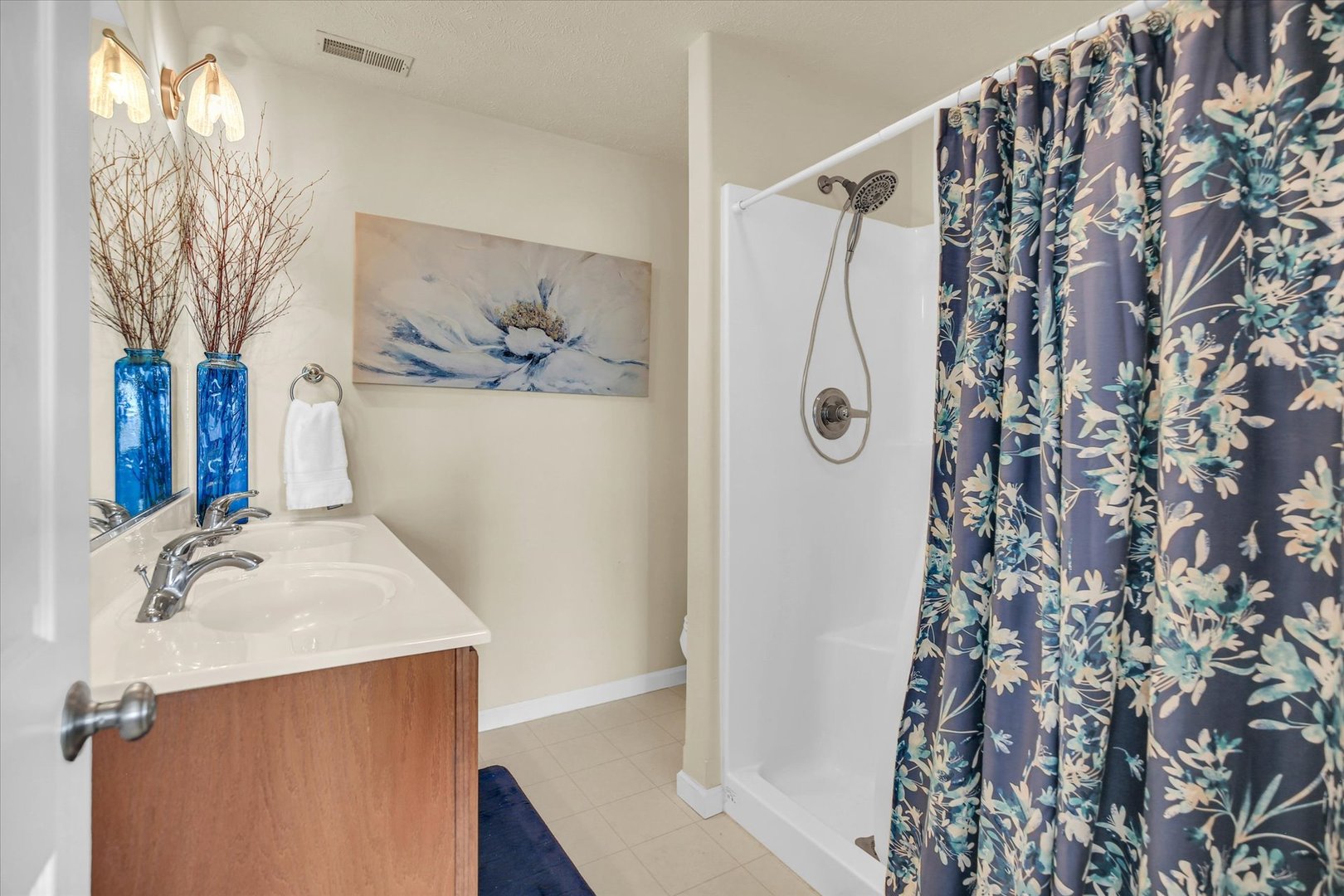 4619 Copper Ridge Road Champaign, IL 61822 - Photo 19 of 29 a bathroom with a sink and mirror